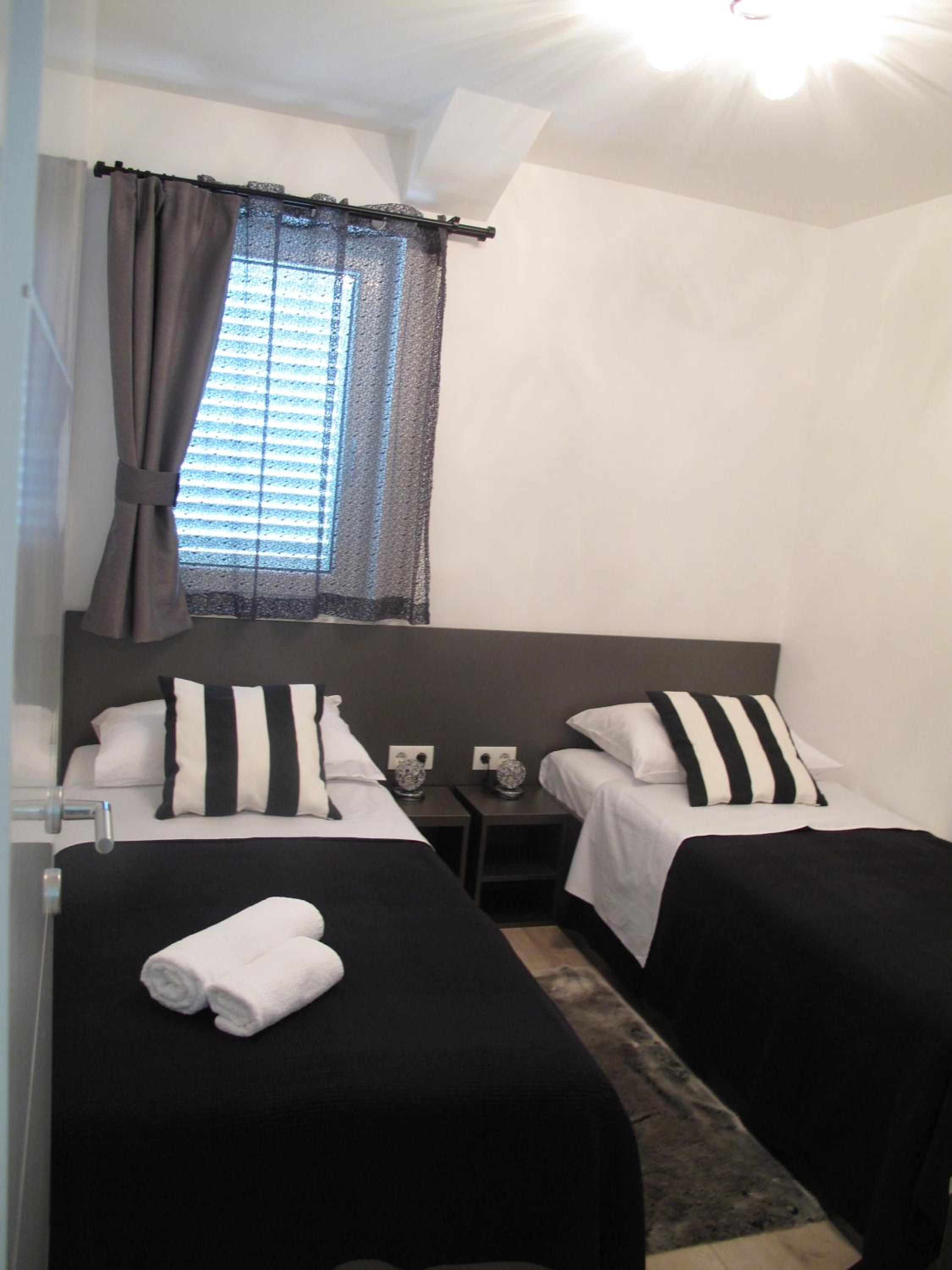 Two-Bedroom Apartment with Balcony and Sea View