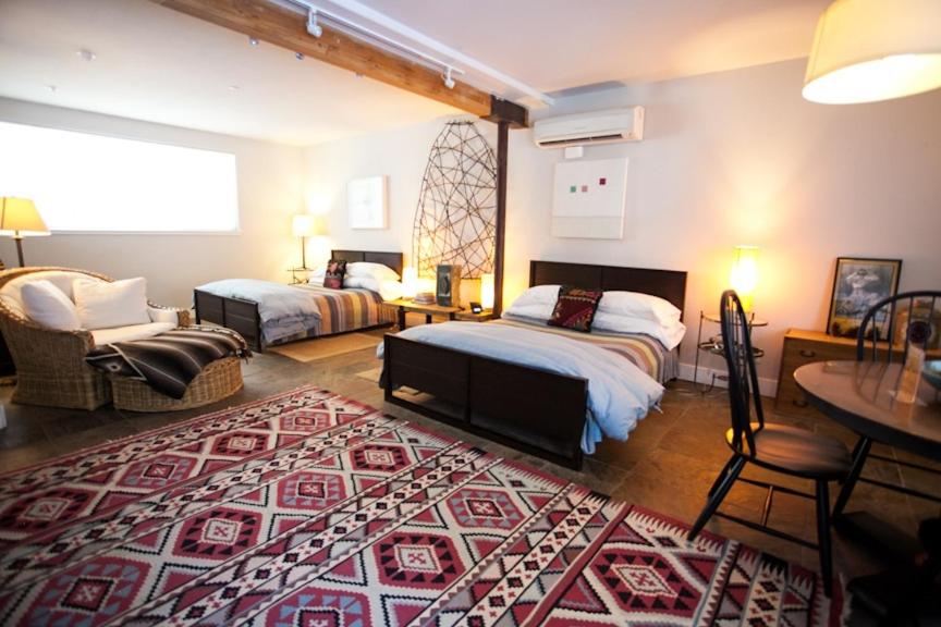 Queen Suite with Two Queen Beds and Spa Bath - Pet Friendly photo 1