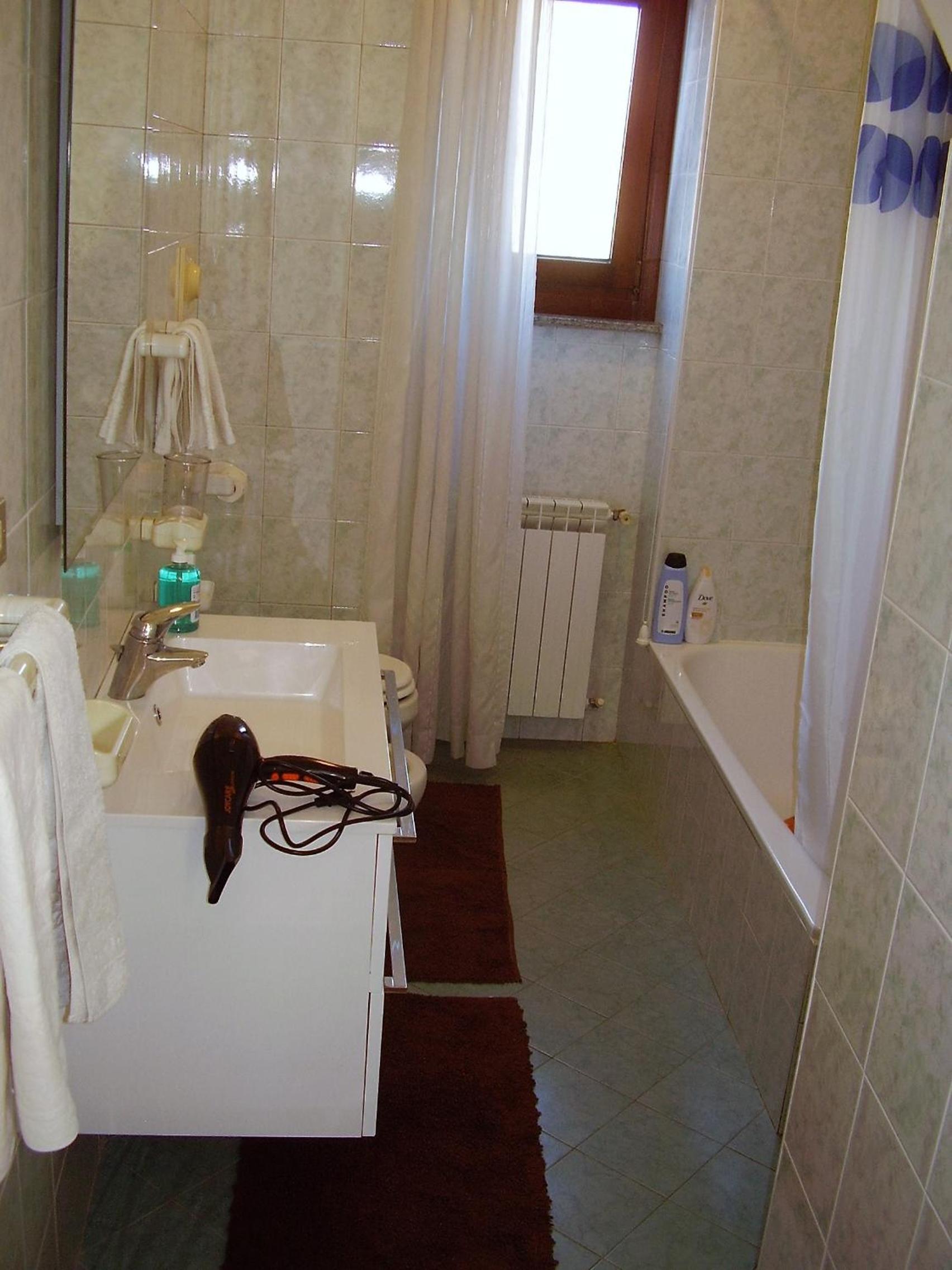 Apartment with Balcony - Photo 15
