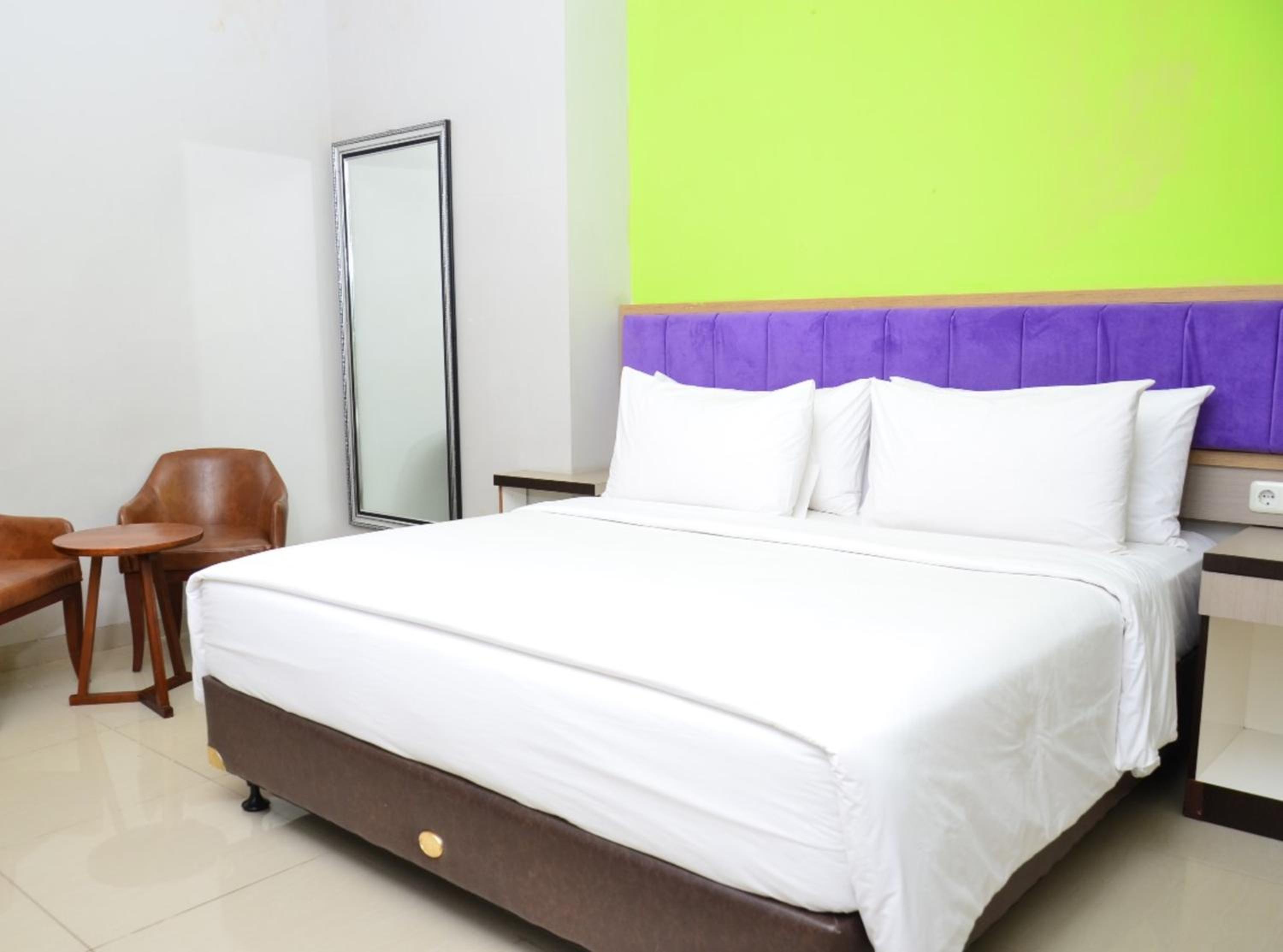 Deluxe Room - Photo 2