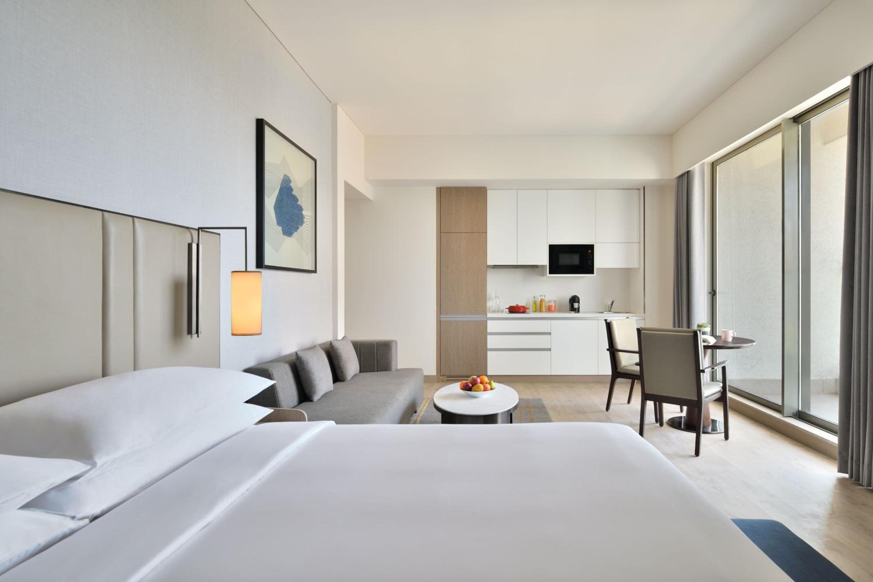 Studio Room, Larger Guest room, 1 King, City view, Balcony