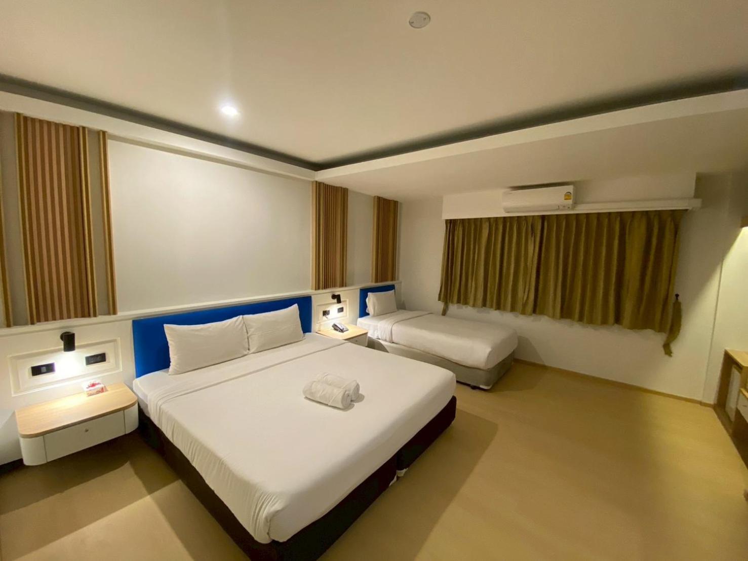Triple Deluxe Room (No Balcony) - Photo 5