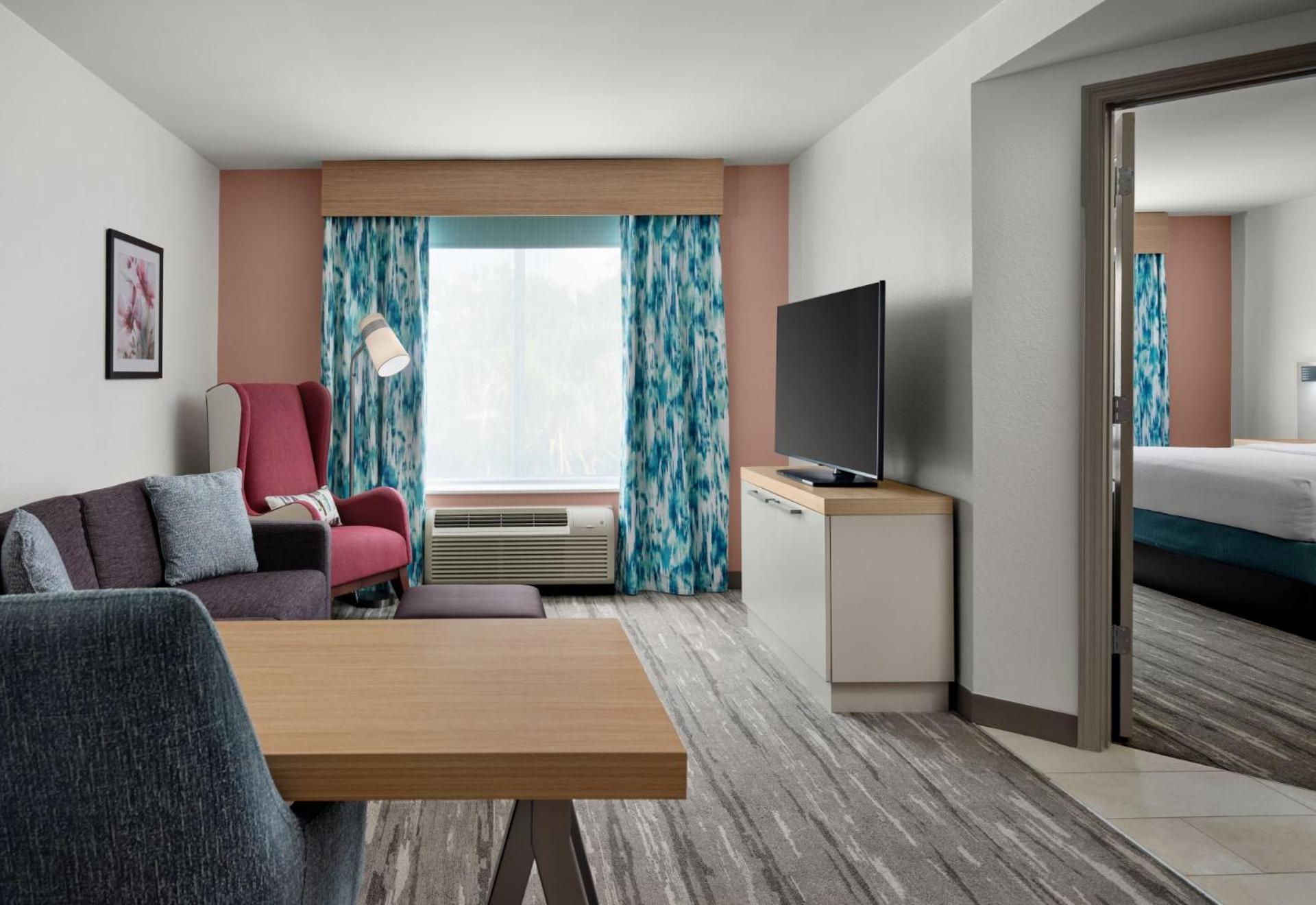 One-Bedroom Suite with One King Bed, Sofa Bed, and Shower