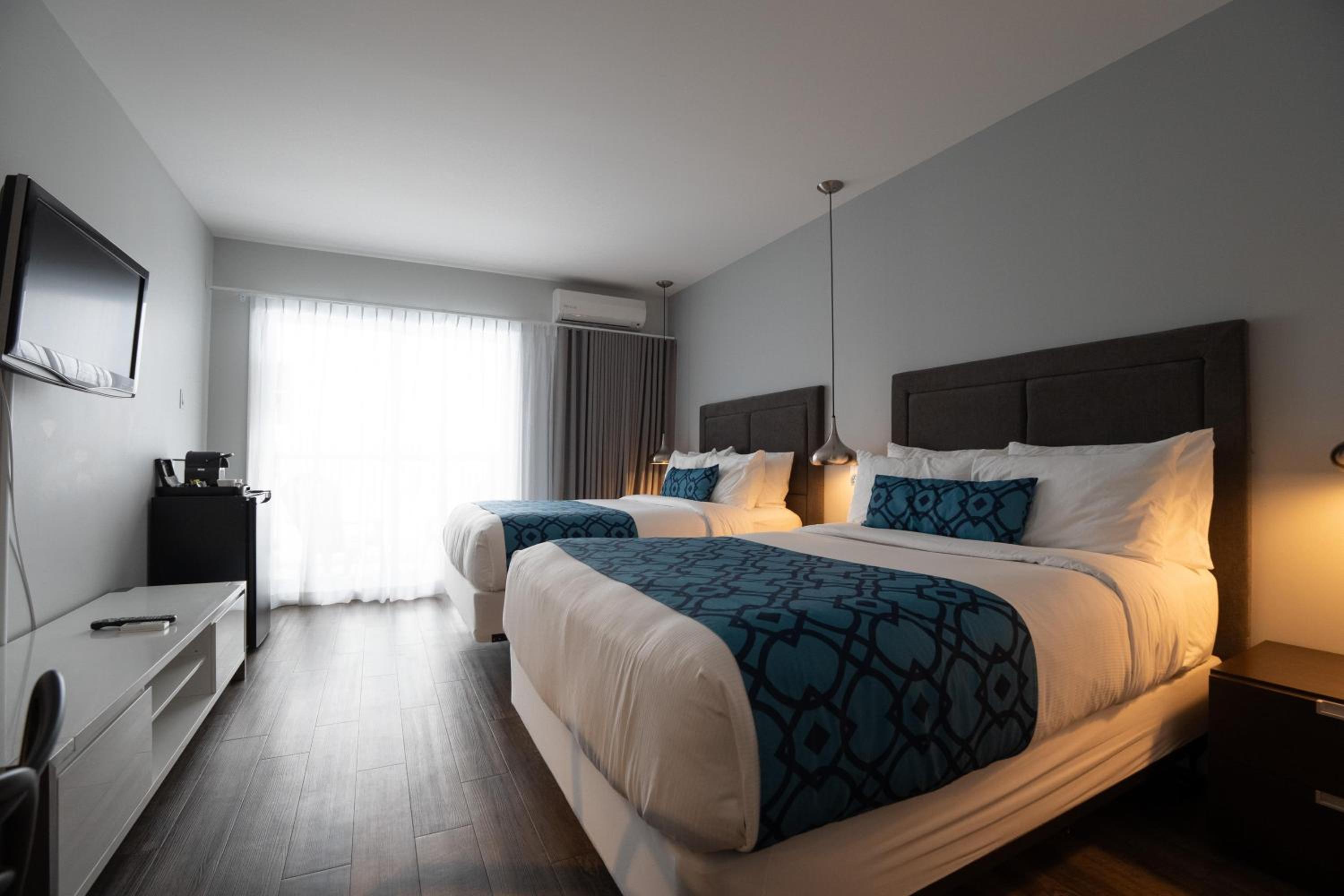 Double Room with Two Double Beds and Patio - First Floor/Non-Smoking