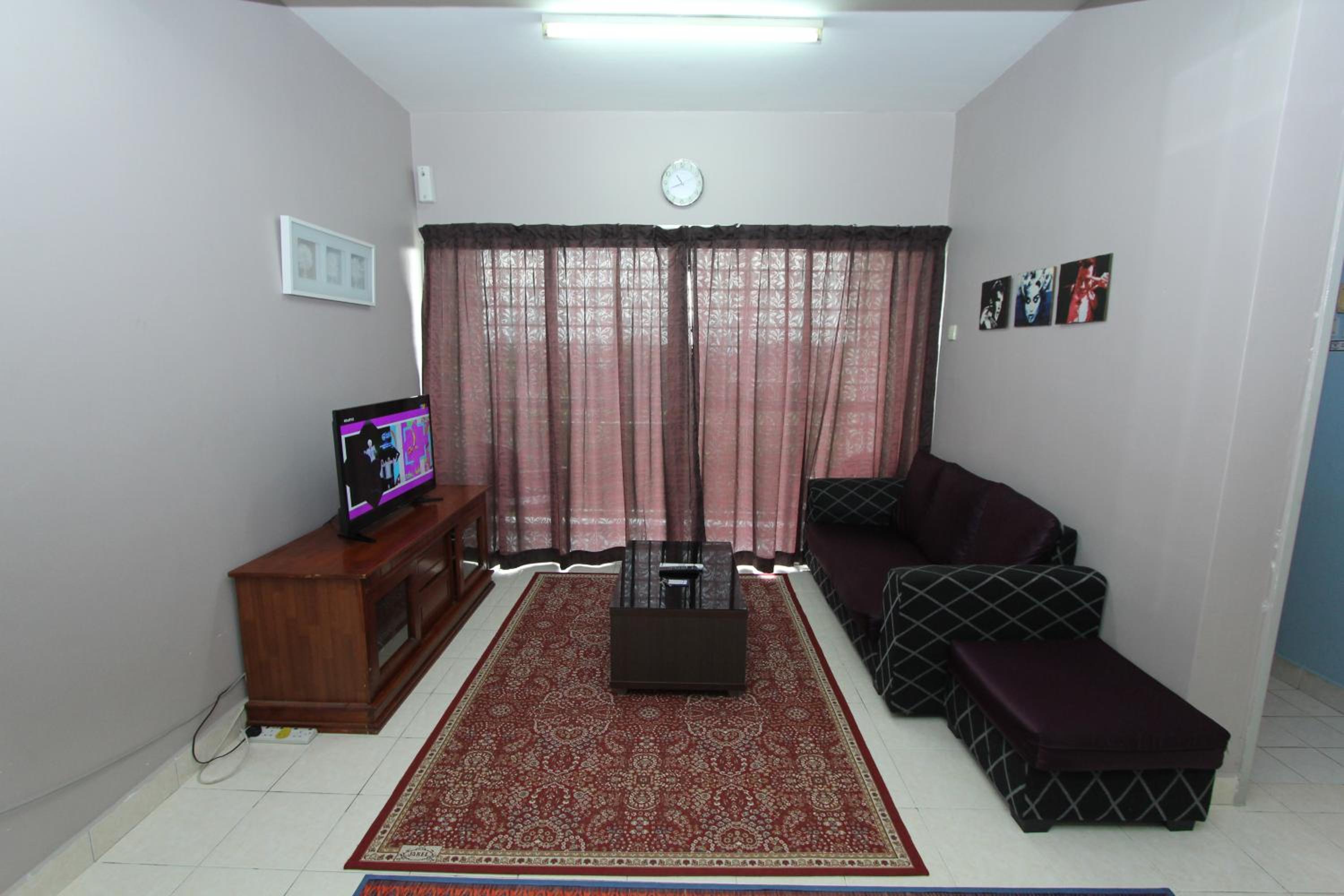 Three-Bedroom Apartment photo 1