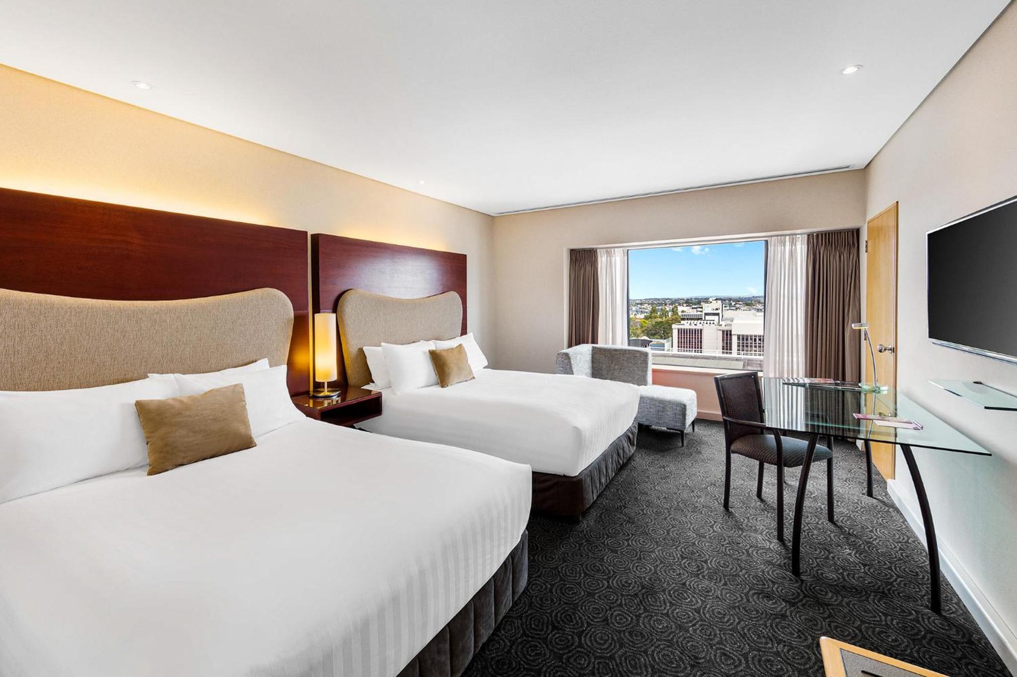 Premium Queen Room with Two Queen Beds - Photo 3