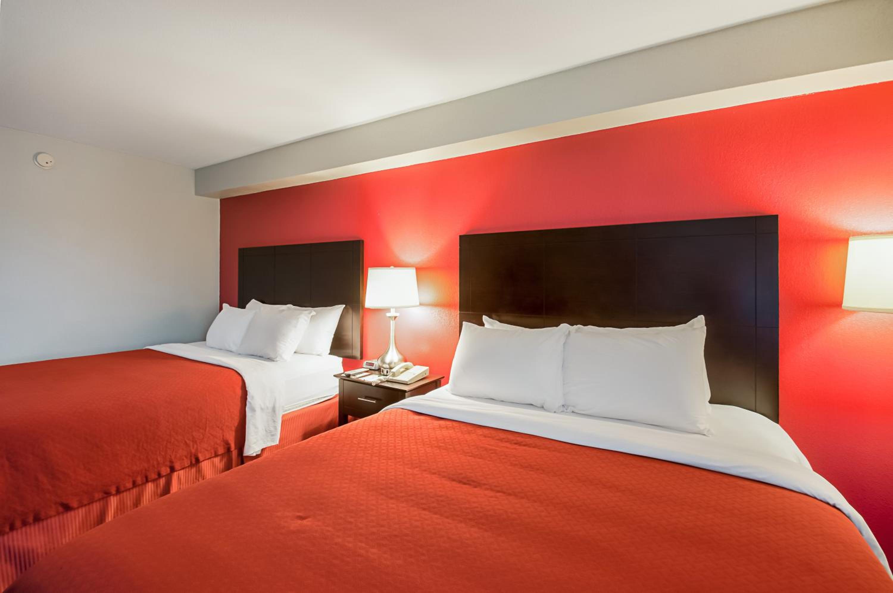 Deluxe Room with Two Queen Beds - Smoking - Photo 1