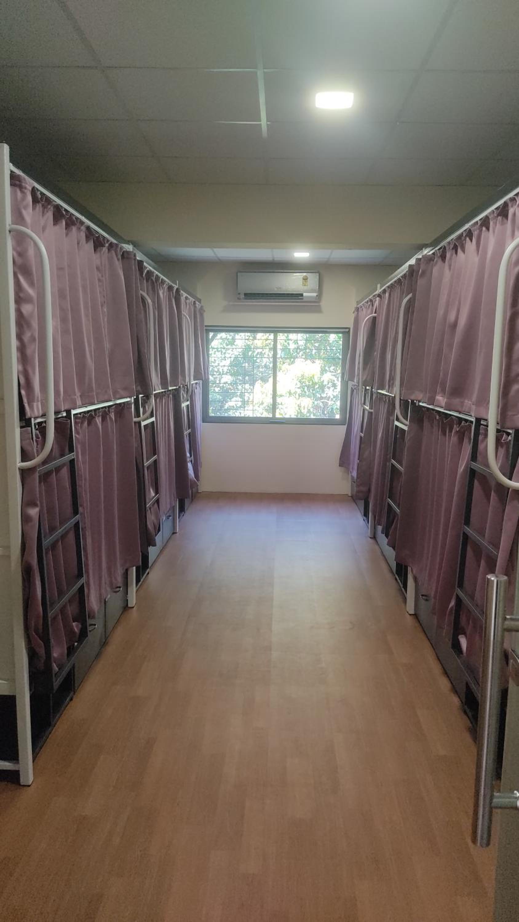 Single Bed in Female Dormitory Room