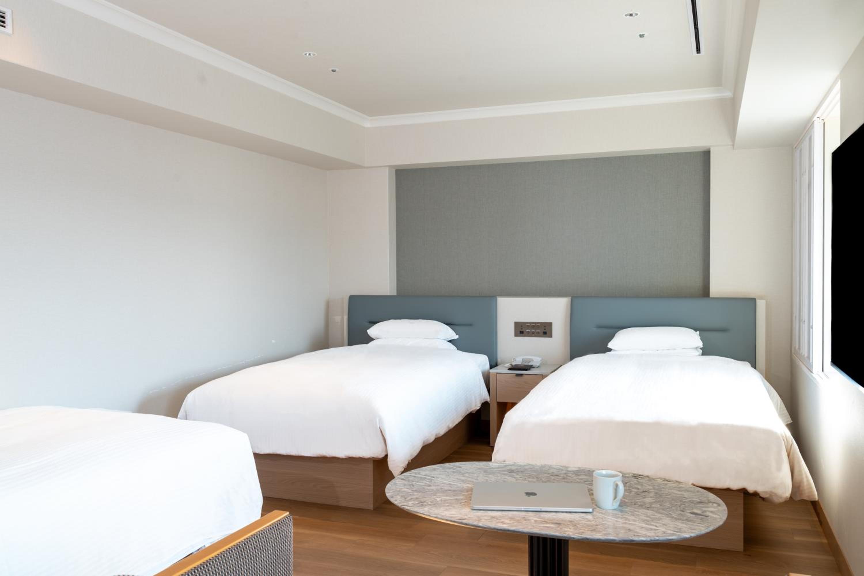 Triple Room with Three Single Beds - Photo 1