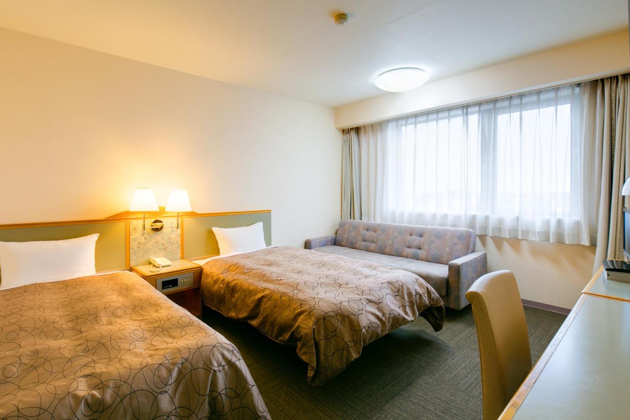 Twin Room - Non-Smoking photo 1