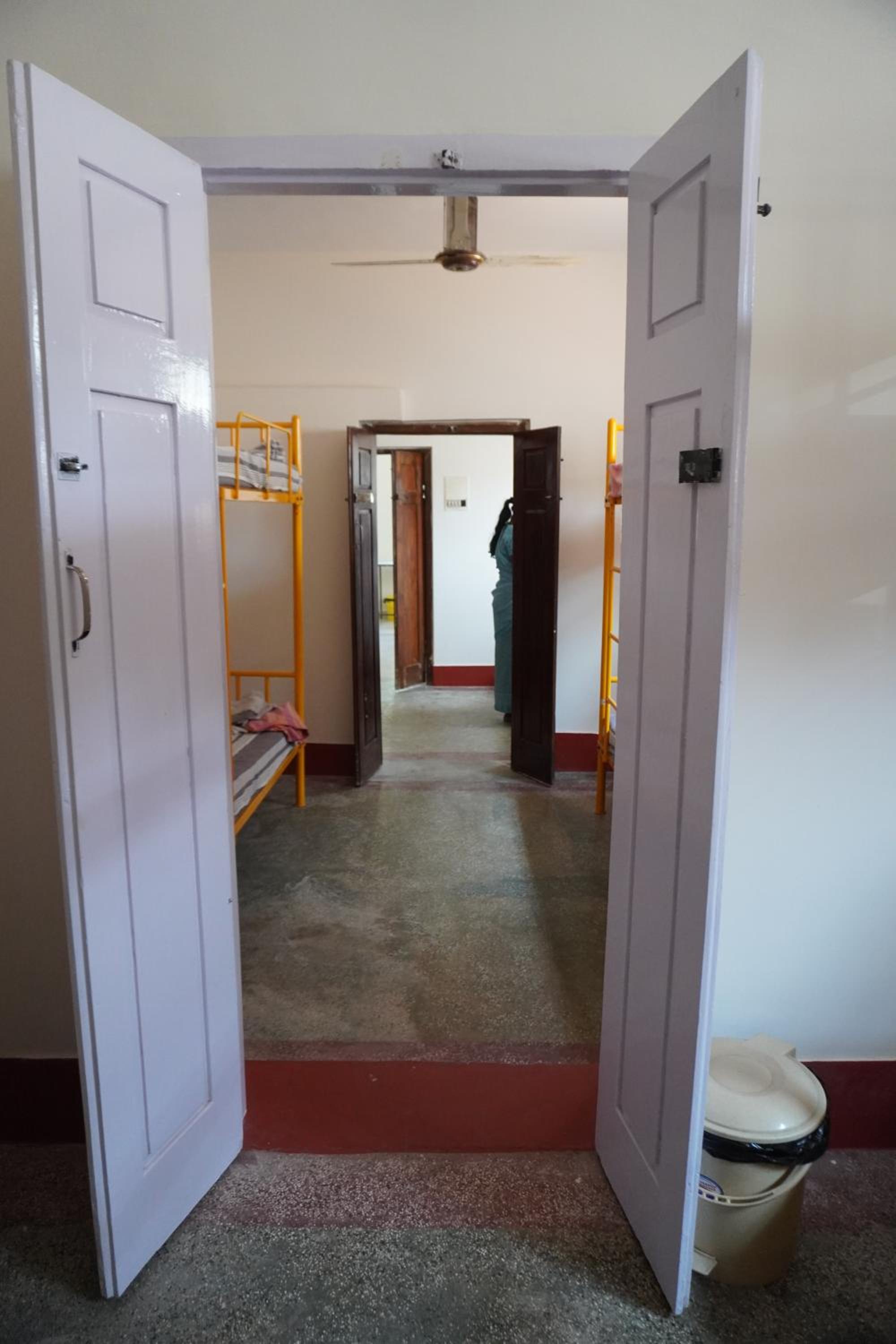 Single Bed in Male Dormitory Room with Shared Bathroom