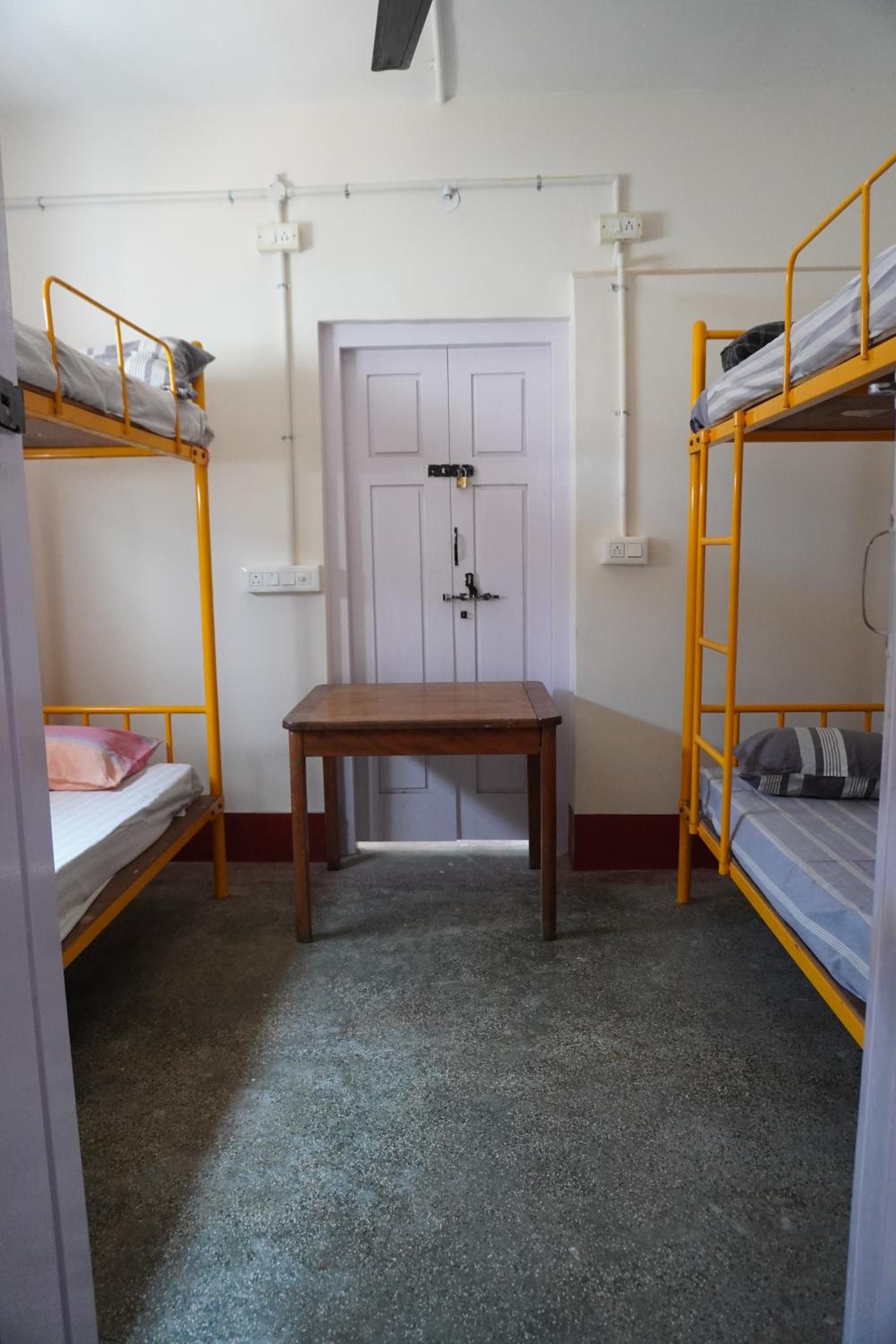 Single Bed in Male Dormitory Room with Shared Bathroom photo 1