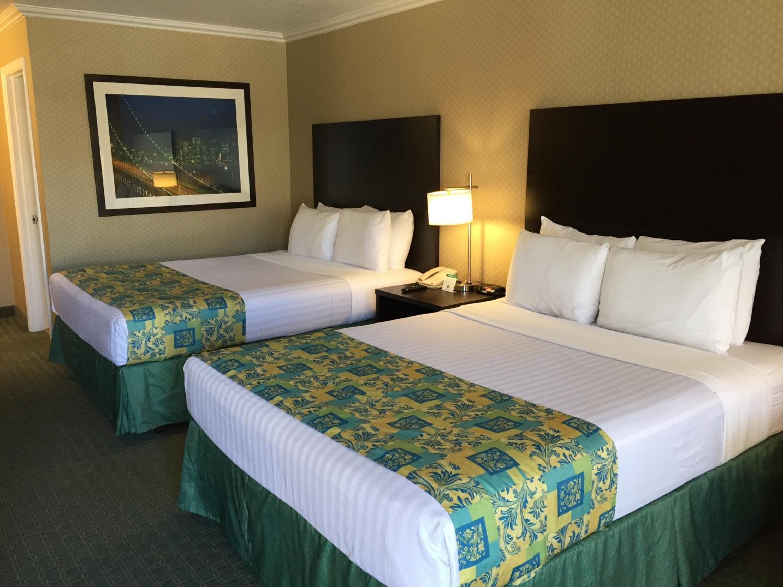 Deluxe Queen Room with Two Queen Beds - Pet Friendly - Photo 1
