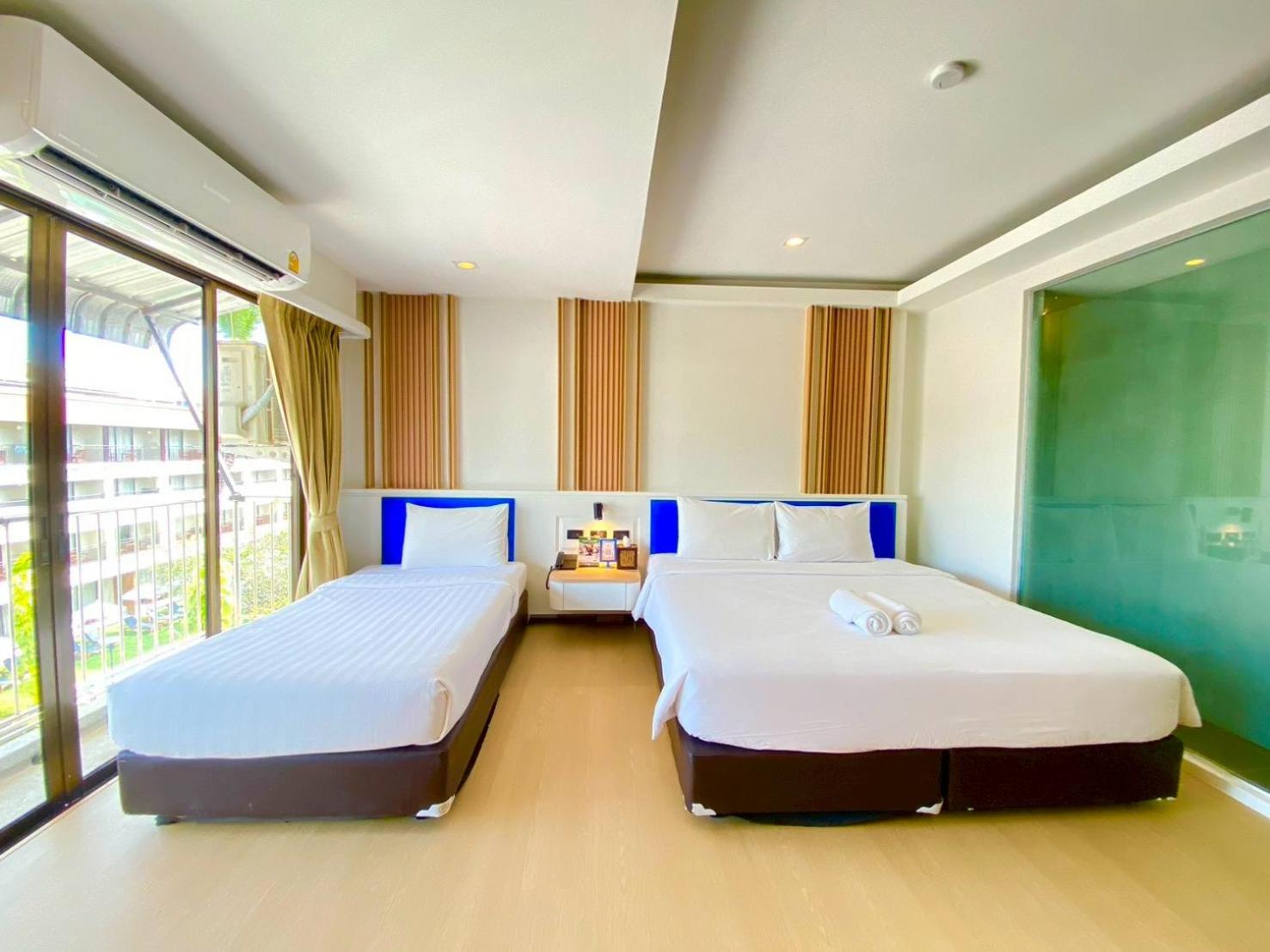 Triple Deluxe with Balcony - Photo 2