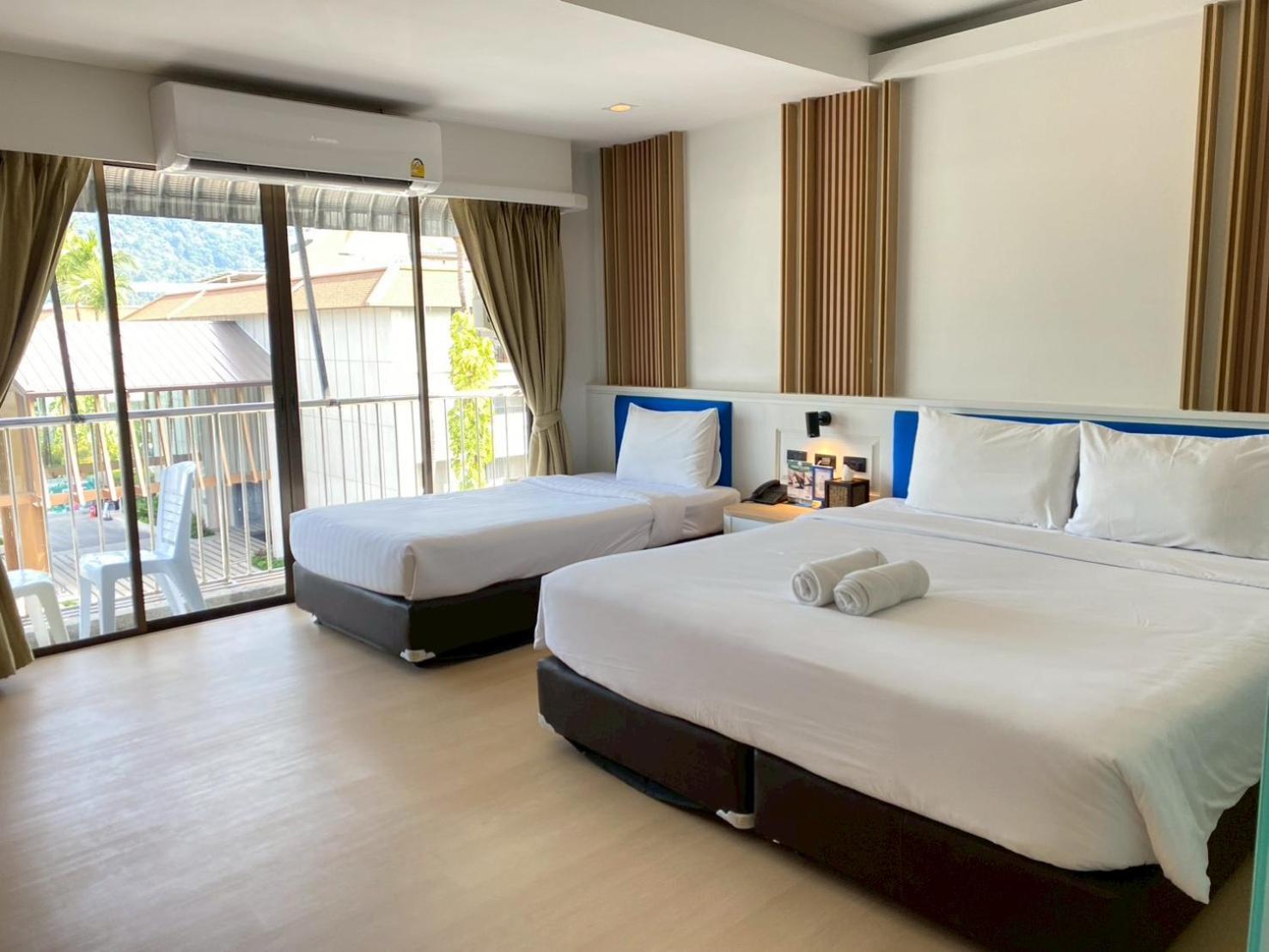 Triple Deluxe with Balcony - Photo 6