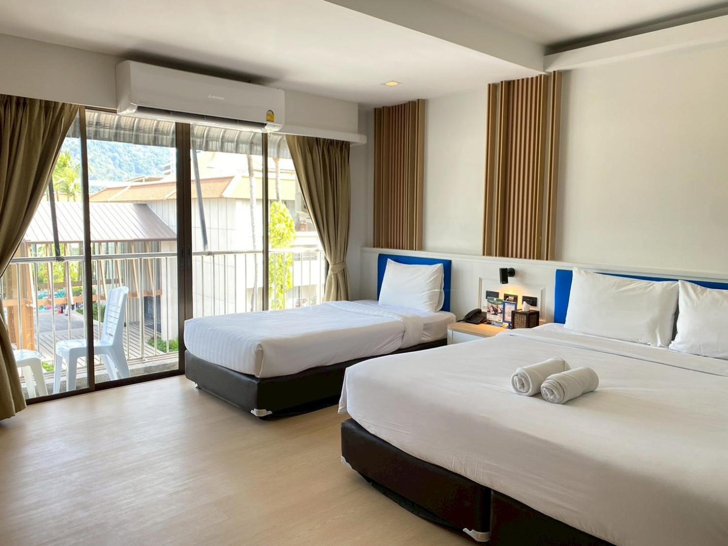 Triple Deluxe with Balcony - Photo 7