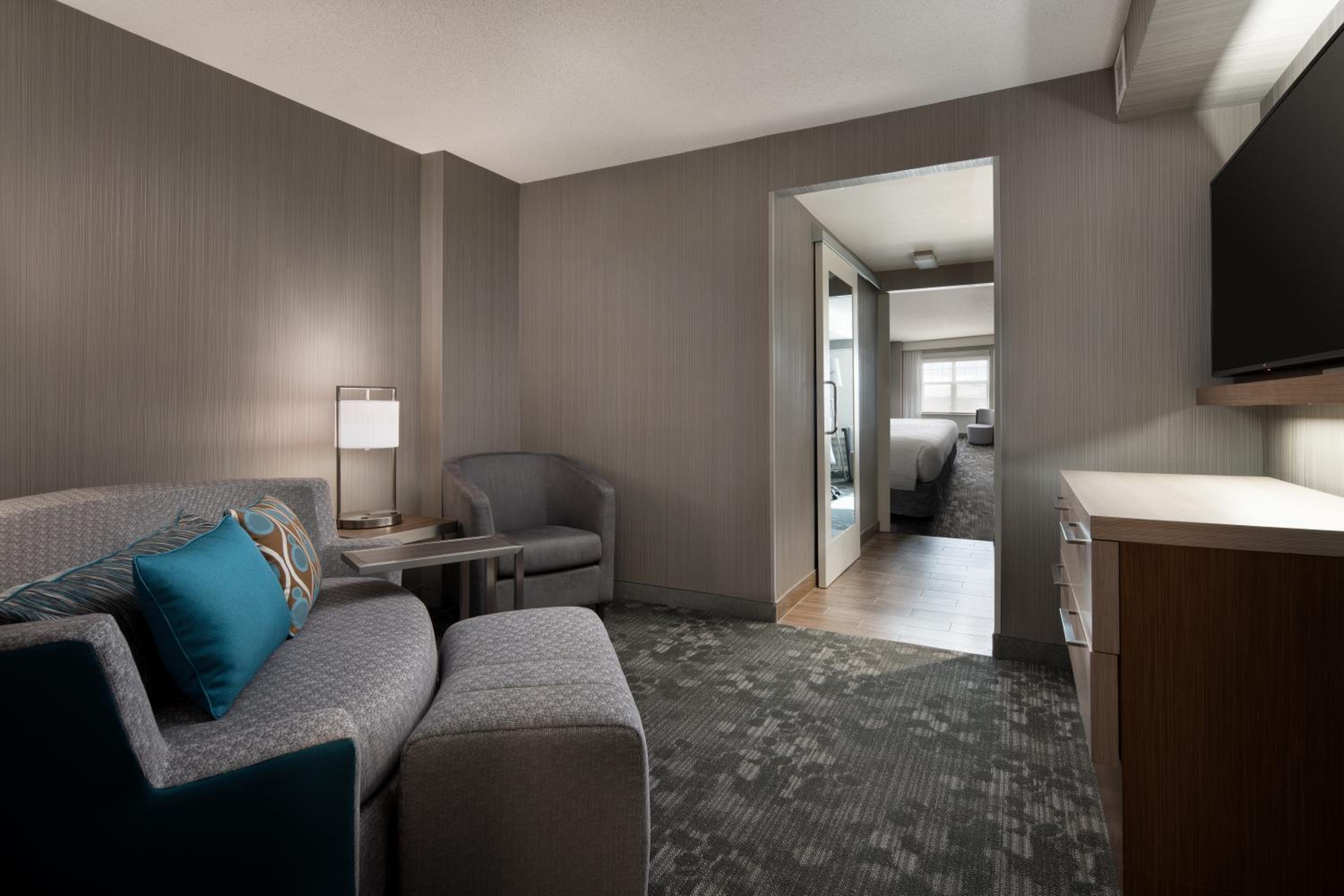 One-Bedroom Junior King Suite with Sofa Bed - Mobility/Hearing Accessible with Transfer Shower