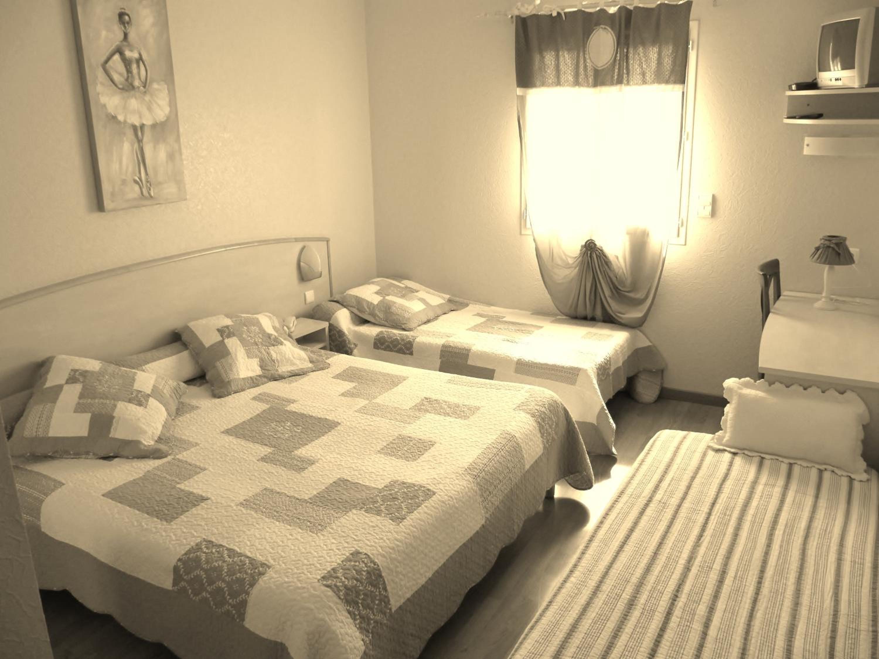 Quadruple Room - Photo 1