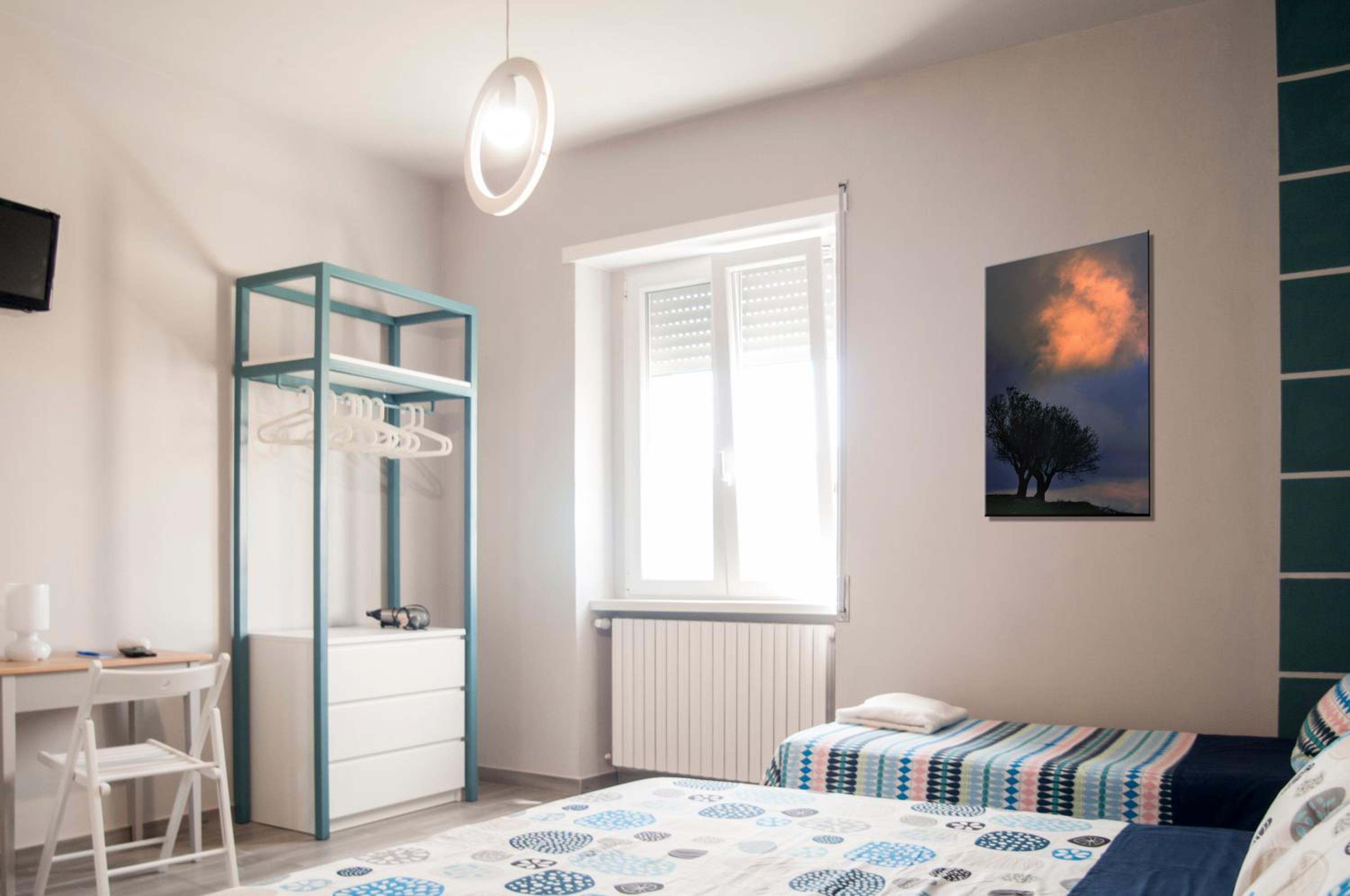 Standard Quadruple Room - Photo 11