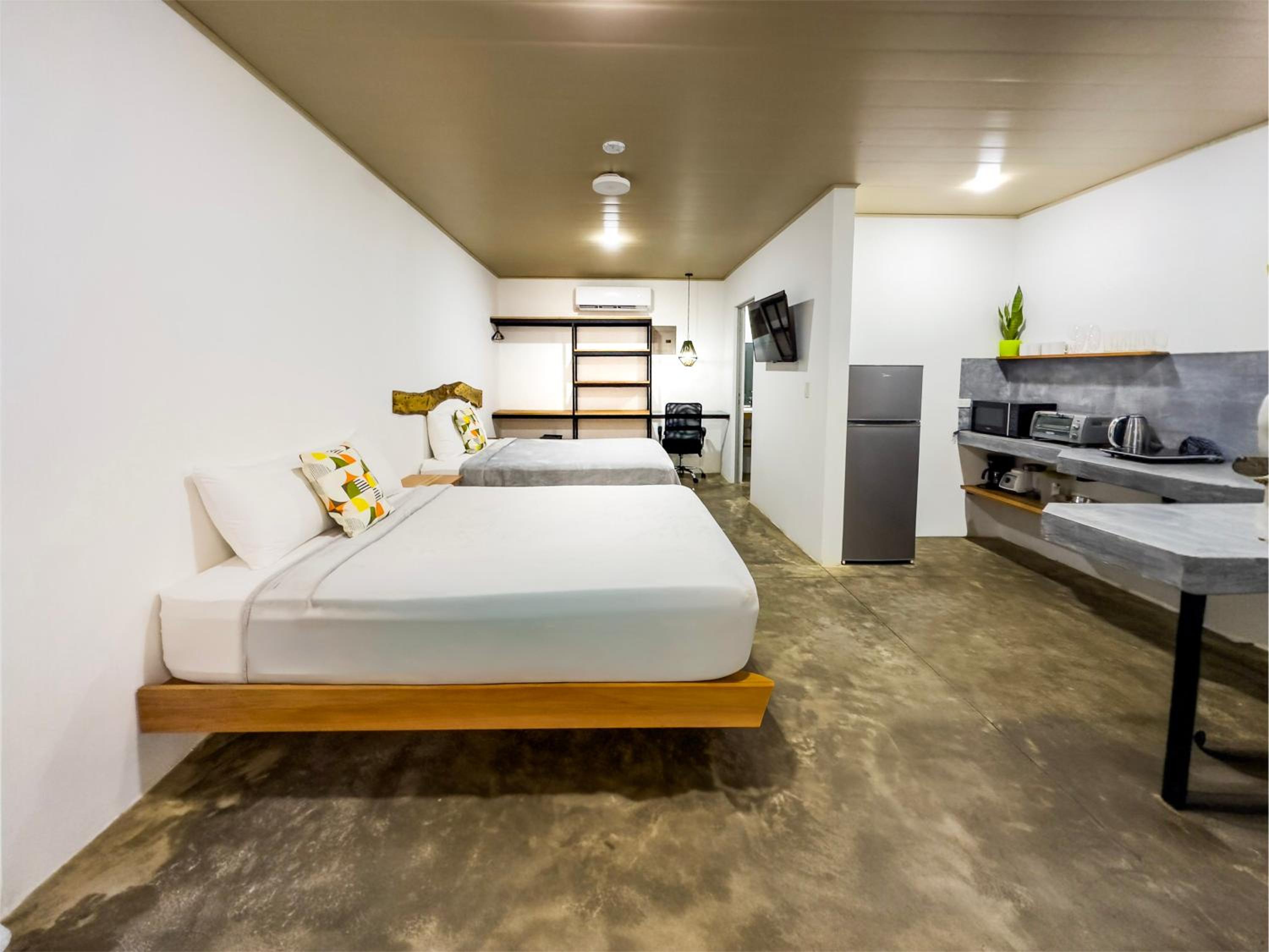 Deluxe Queen Room with Two Queen Beds photo 1