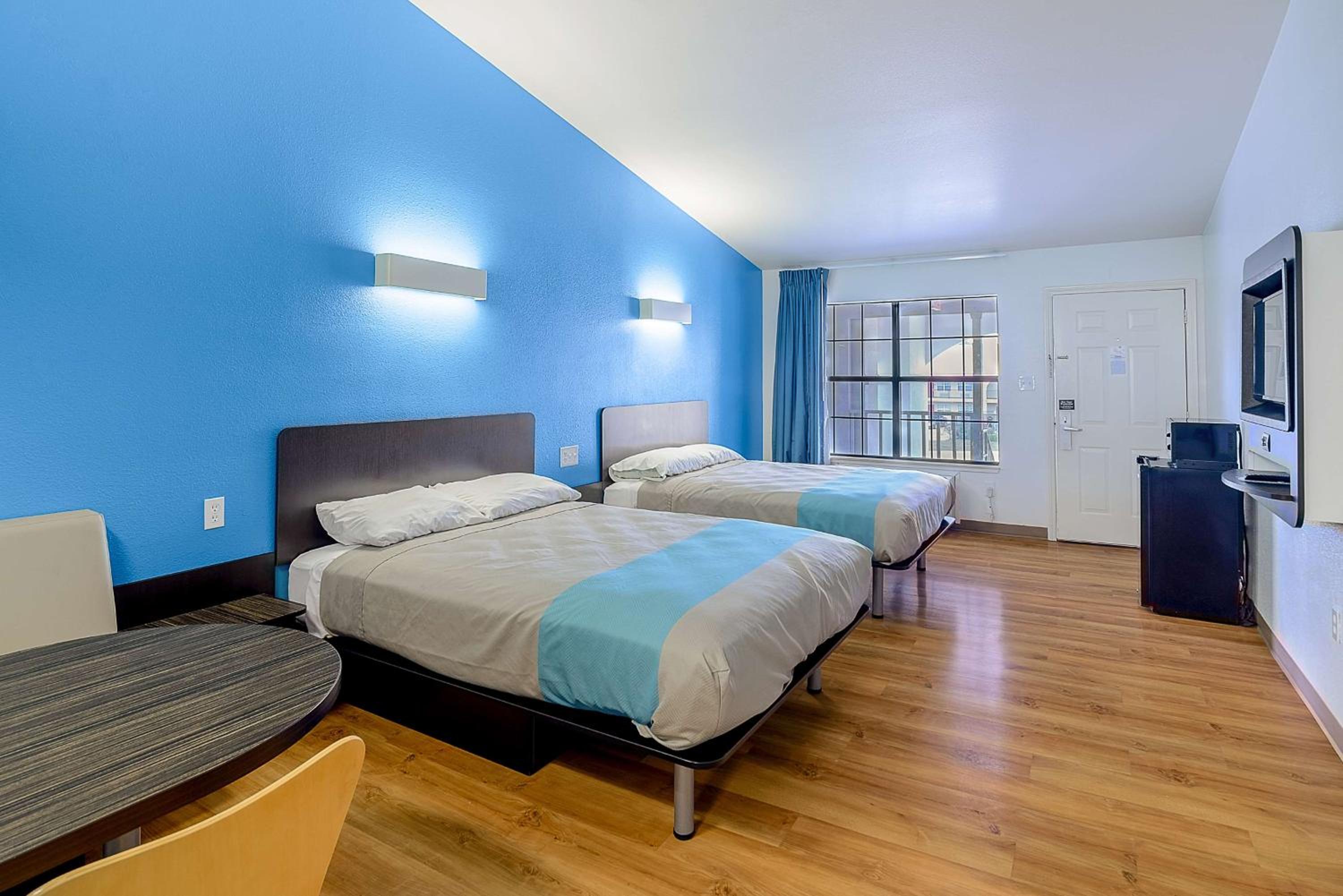 Deluxe Queen Room with Two Queen Beds - Non-Smoking - Photo 1