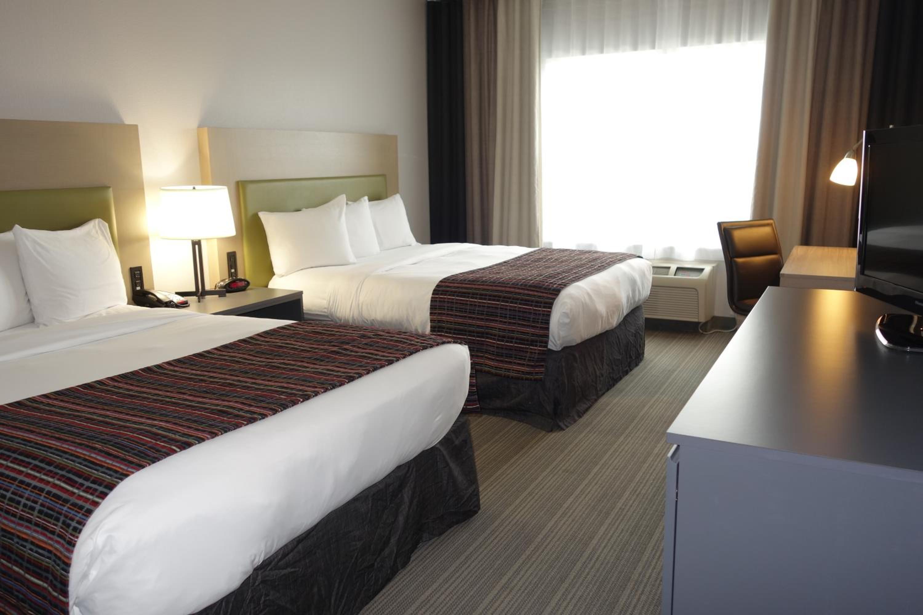 Queen Room with Two Queen Beds - Non-Smoking, Non-Pet Friendly - Photo 1