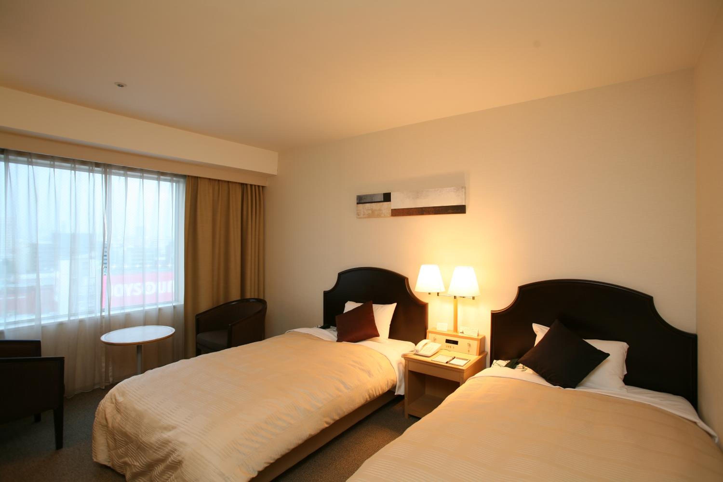 Twin Room - Non-Smoking - Photo 1