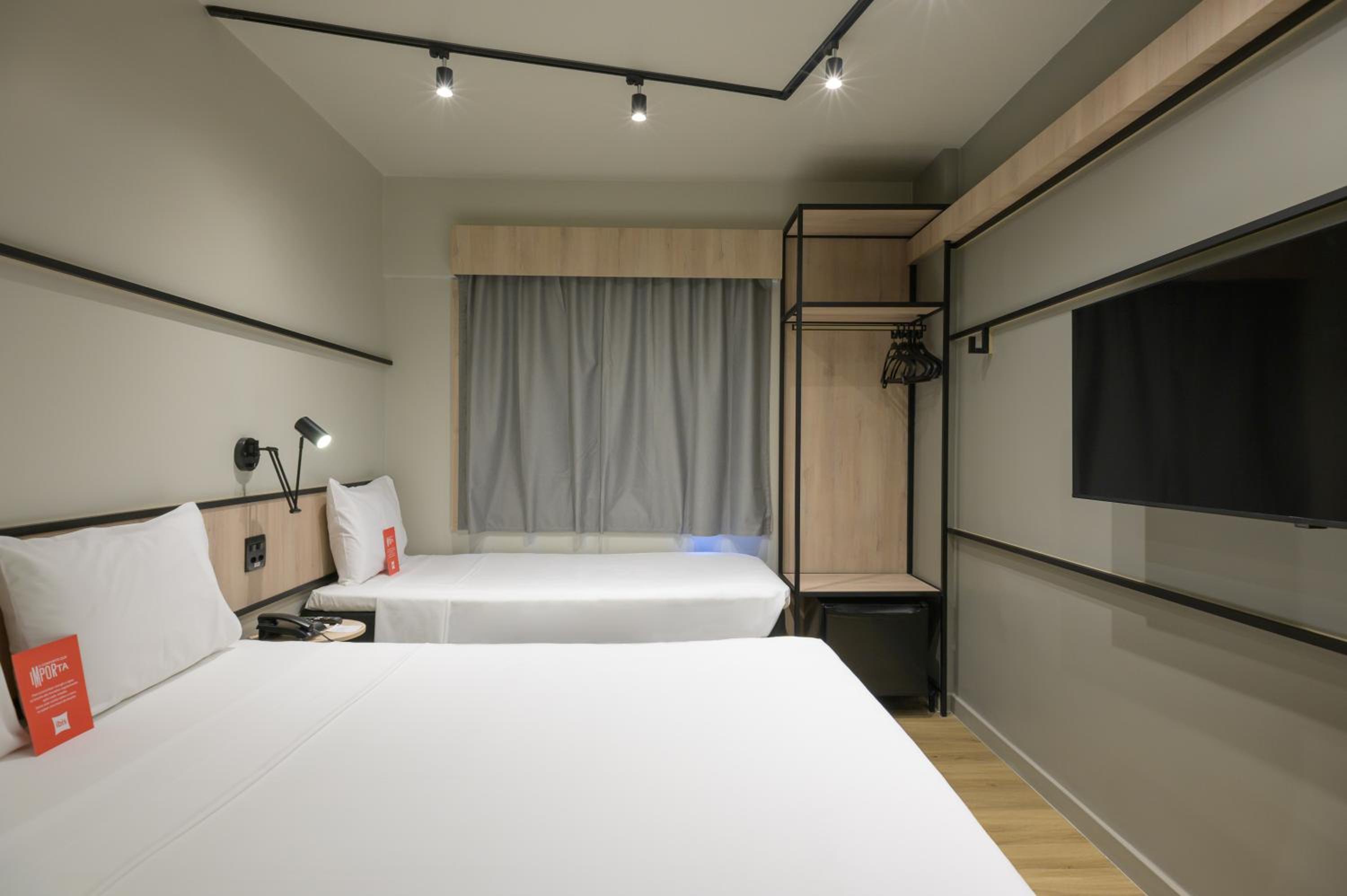 Room with a Double Bed and One Single Bed