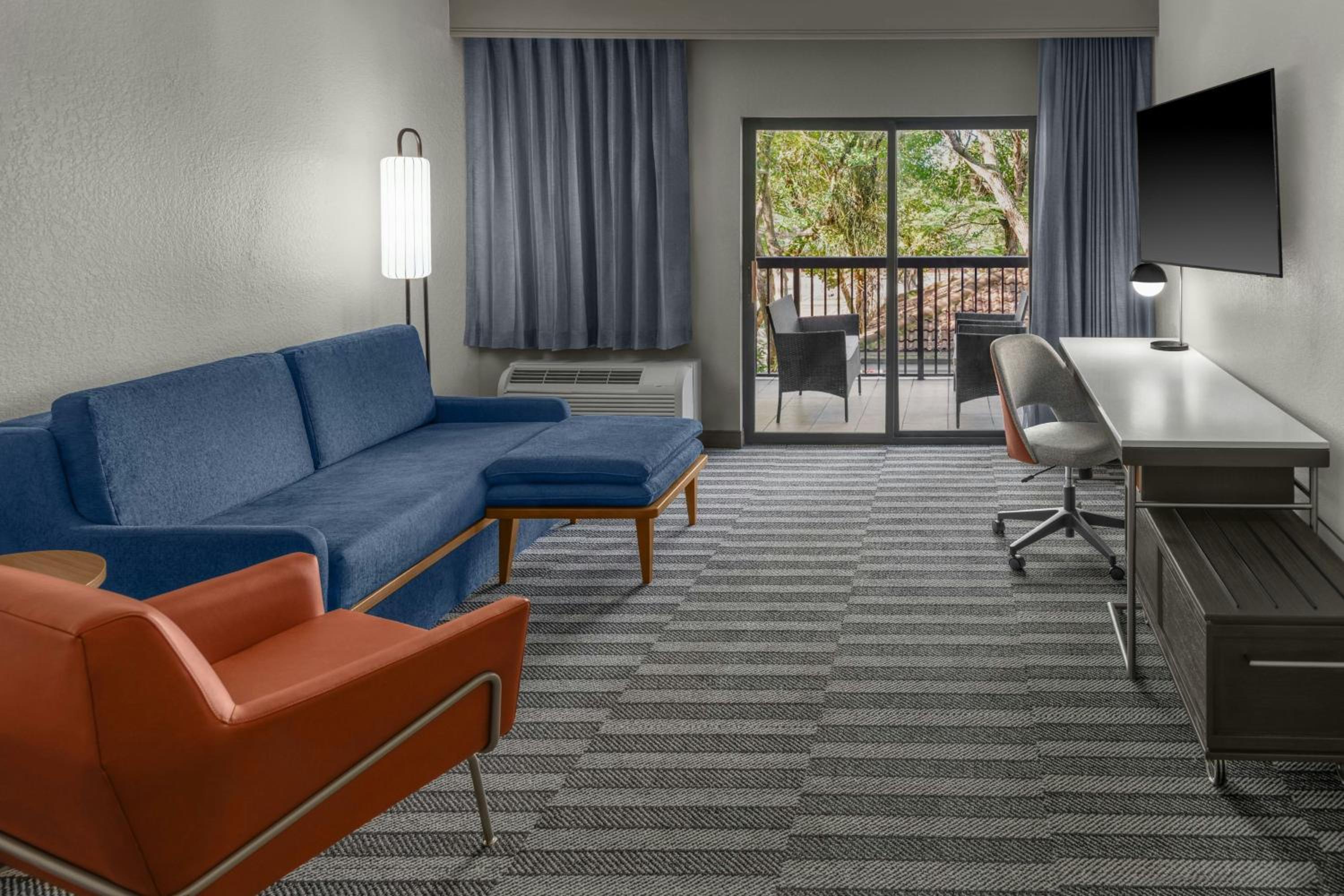 One-Bedroom King Suite with Balcony and Sofa Bed - Photo 1