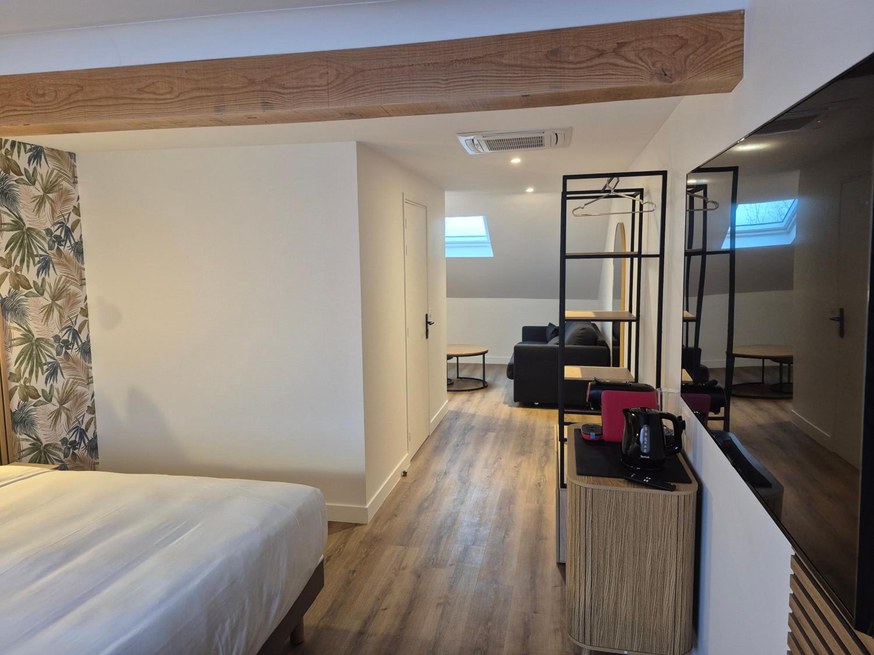 Two-Bedroom Signature King Suite with Sofa Bed - Photo 3