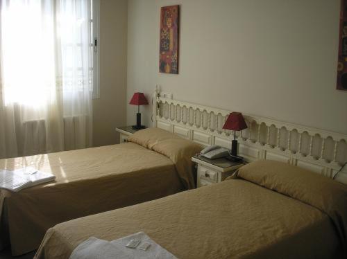 Triple Room (2 Adults + 1 Child)