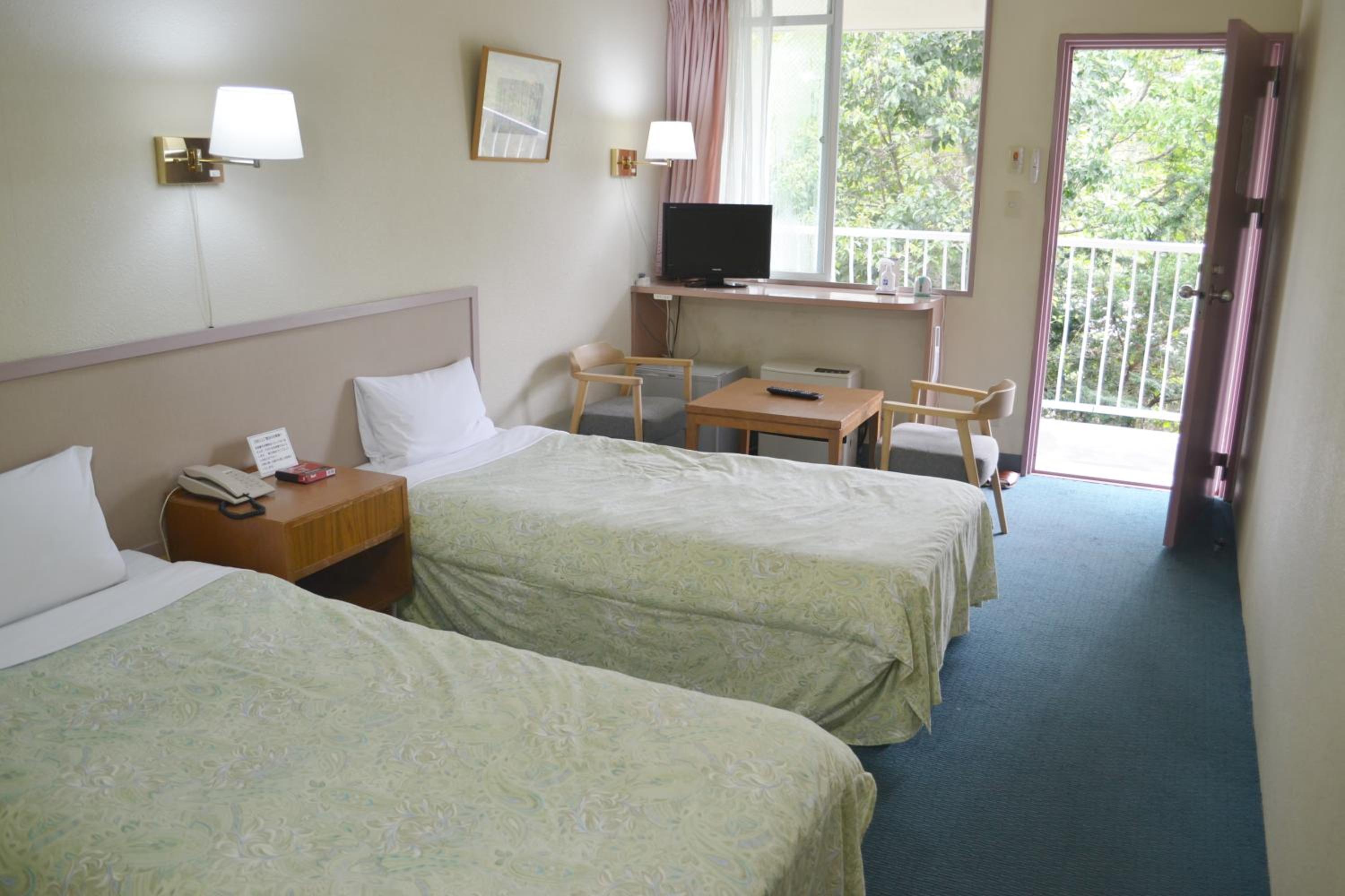 Twin Room - Non-Smoking photo 1