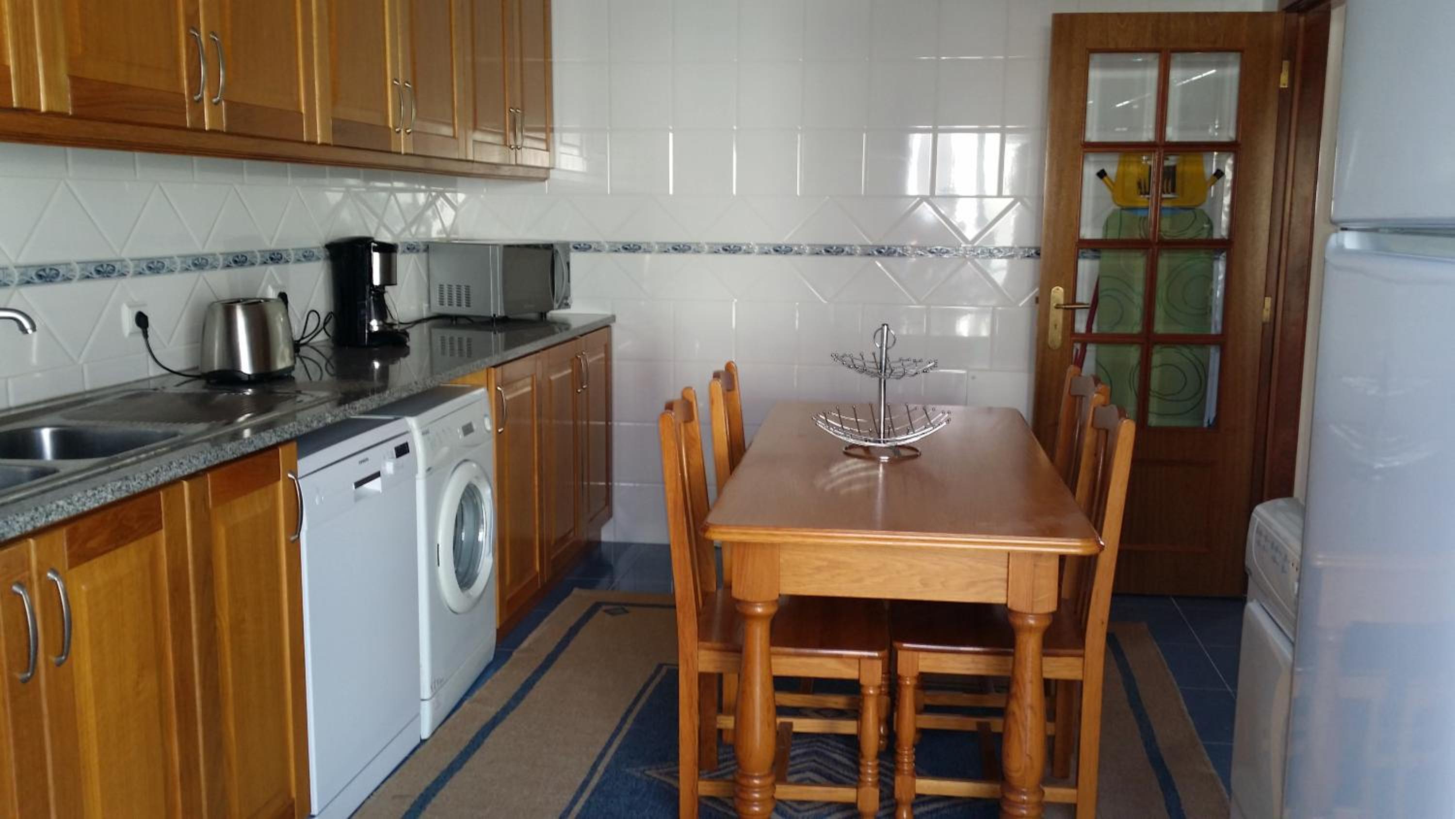 Three-Bedroom House - Photo 21