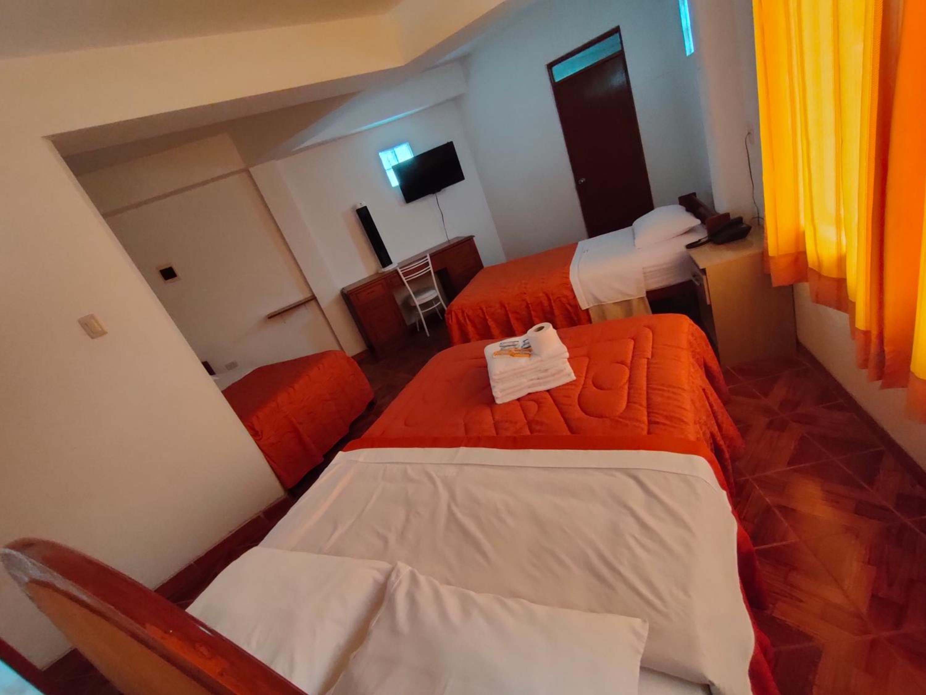 Deluxe Triple Room