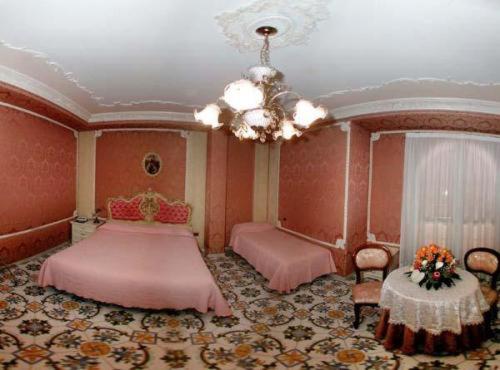 Chambre Double avec 2 Lits d'Appoint