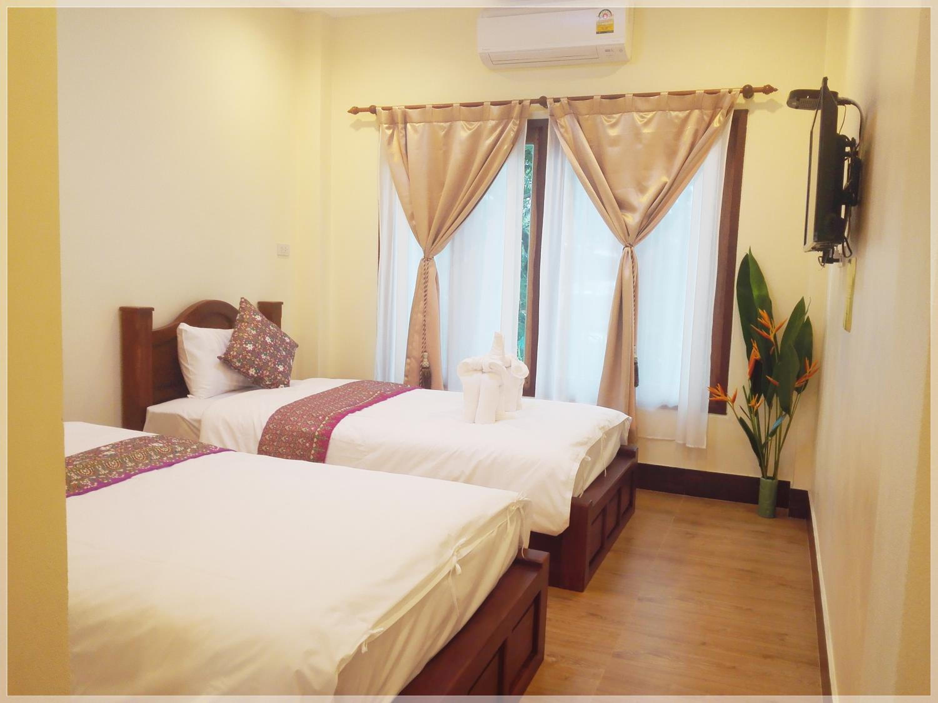 Standard Twin Room - Photo 3