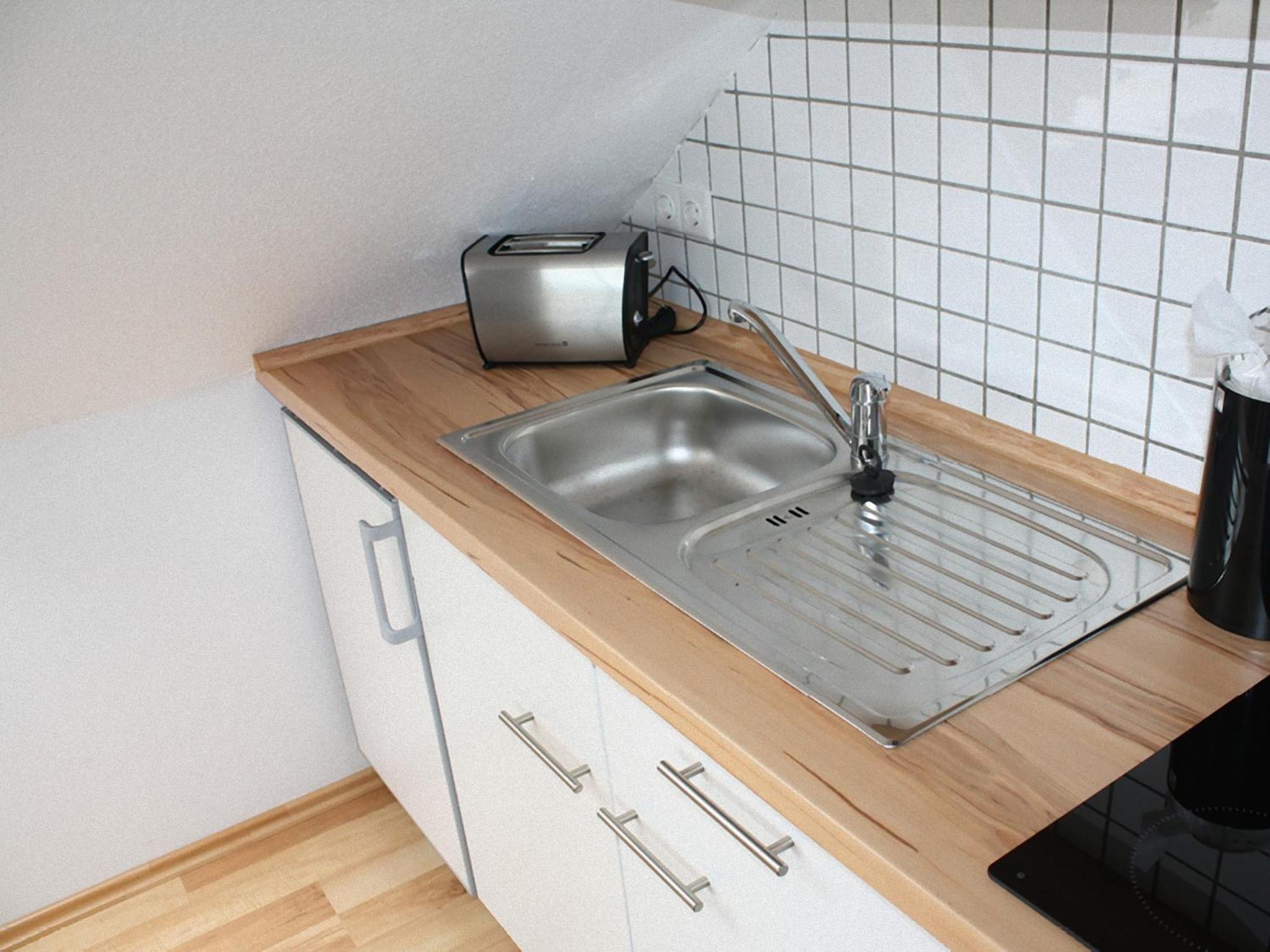 Apartment with Balcony - Photo 13