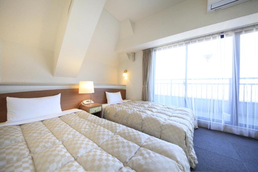 Standard Twin Room - Photo 1