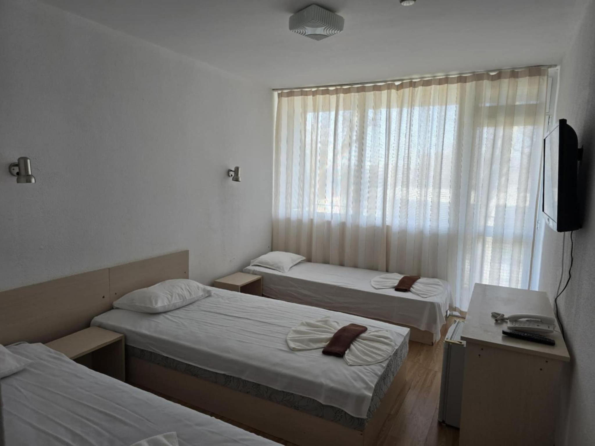 Twin Room with Balcony (2 Adults + 1 Child) photo 3