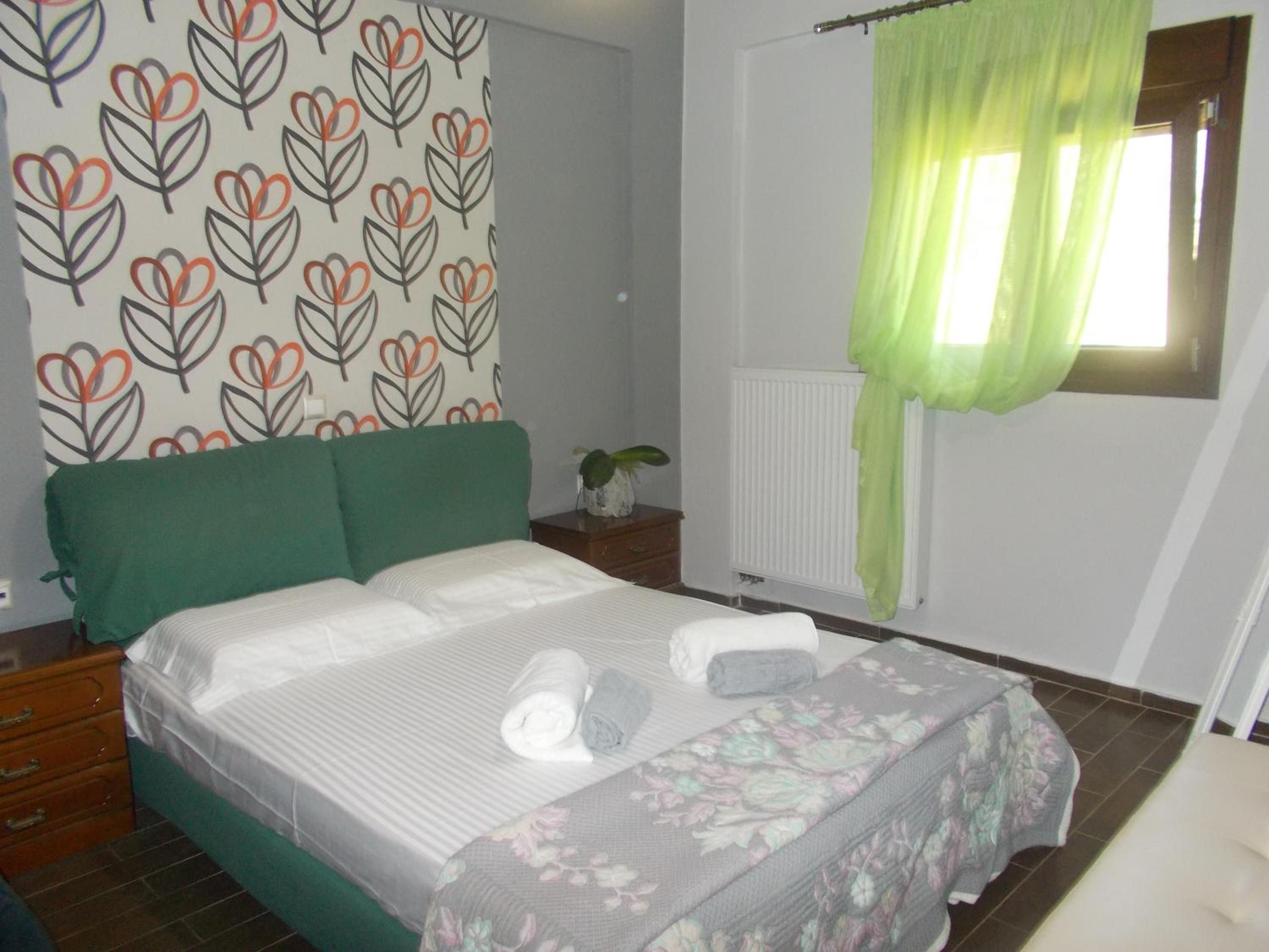 Three-Bedroom House - Photo 21