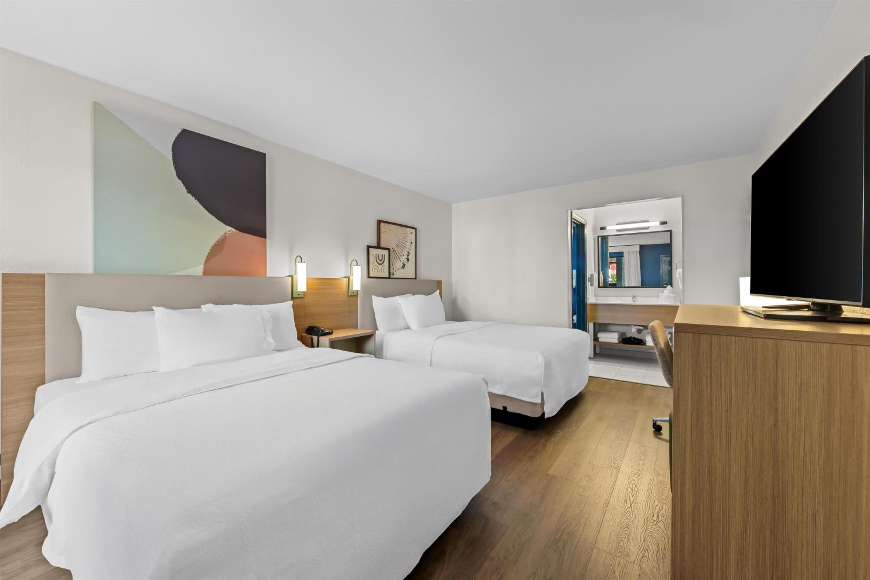 Queen Room with Two Queen Beds - Photo 1
