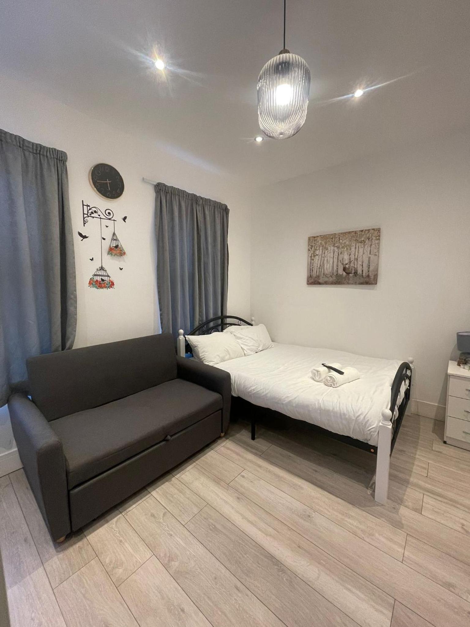 Quadruple Room with Private Bathroom photo 1