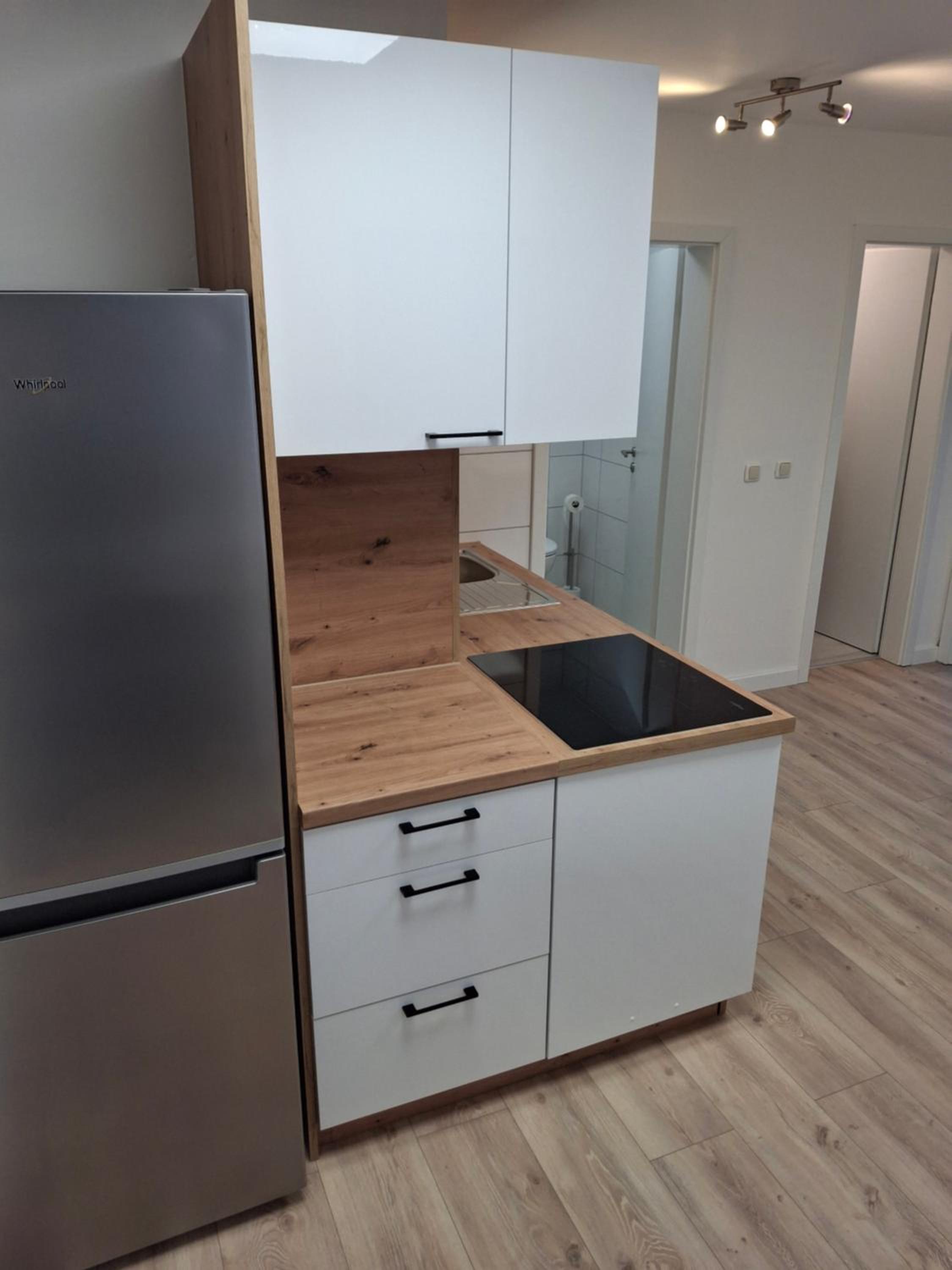 Three-Bedroom Apartment with Balcony photo 1