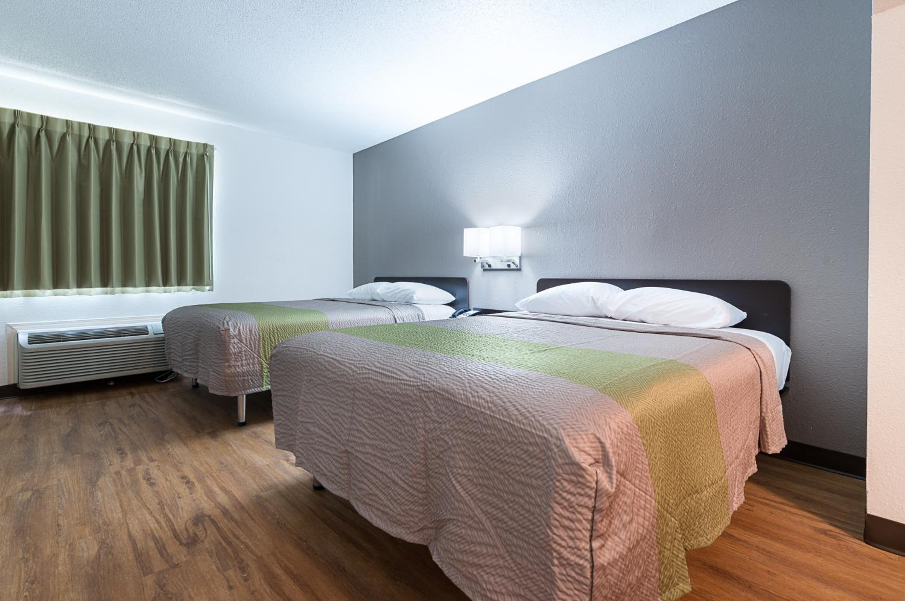 Deluxe Queen Room with Two Queen Beds - Non-Smoking photo 1