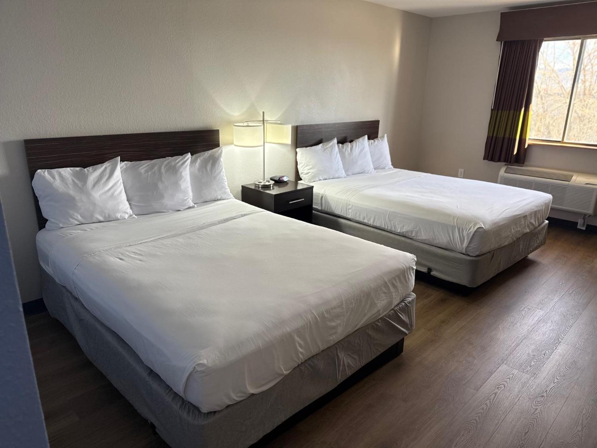 Standard Queen Room with Two Queen Beds and Shower Bath - Photo 1
