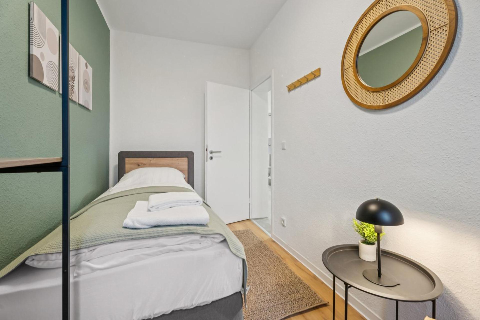 Three-Bedroom Apartment with Balcony photo 2