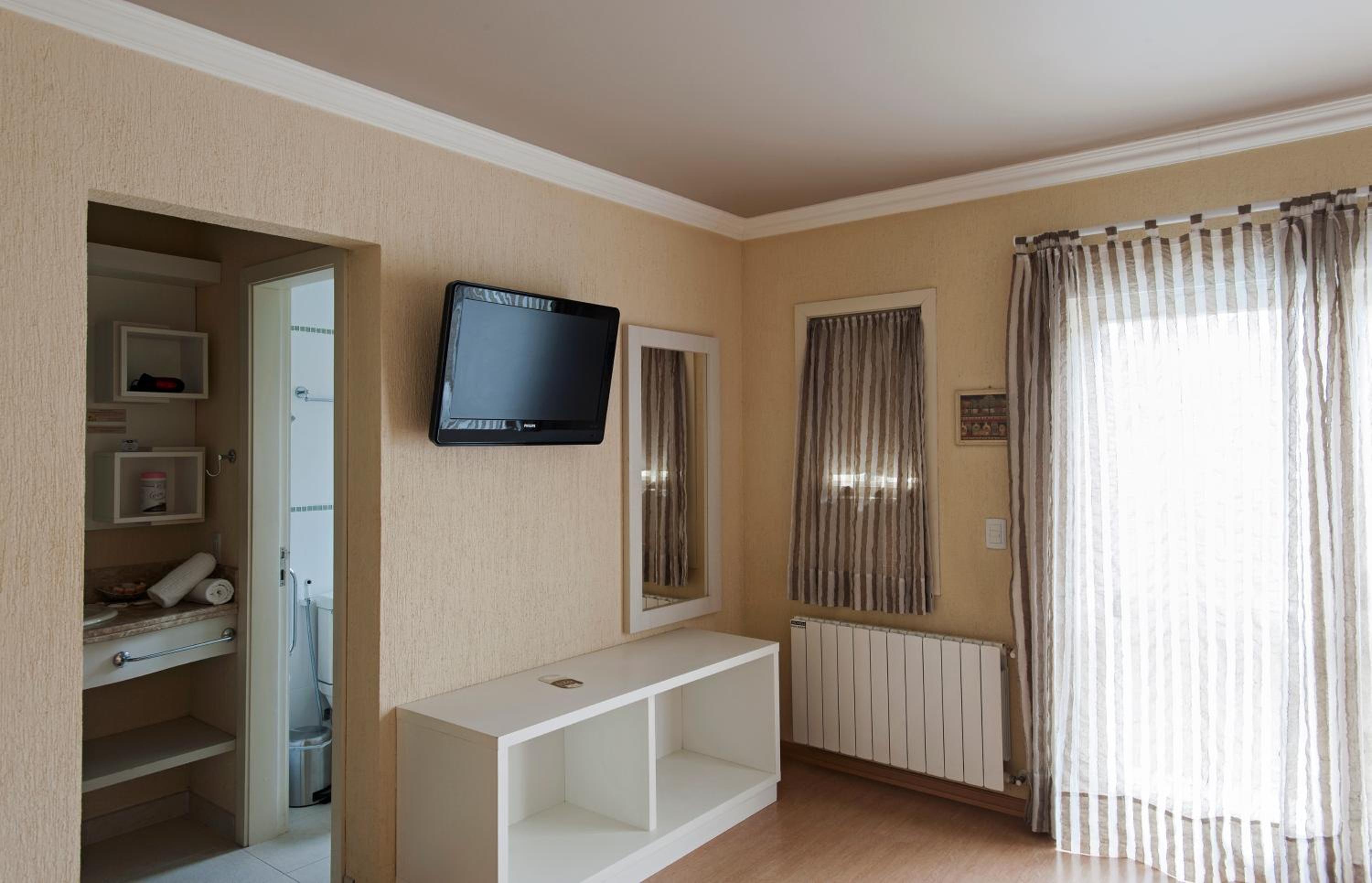 Superior Quadruple Suite com Smart TV photo 3