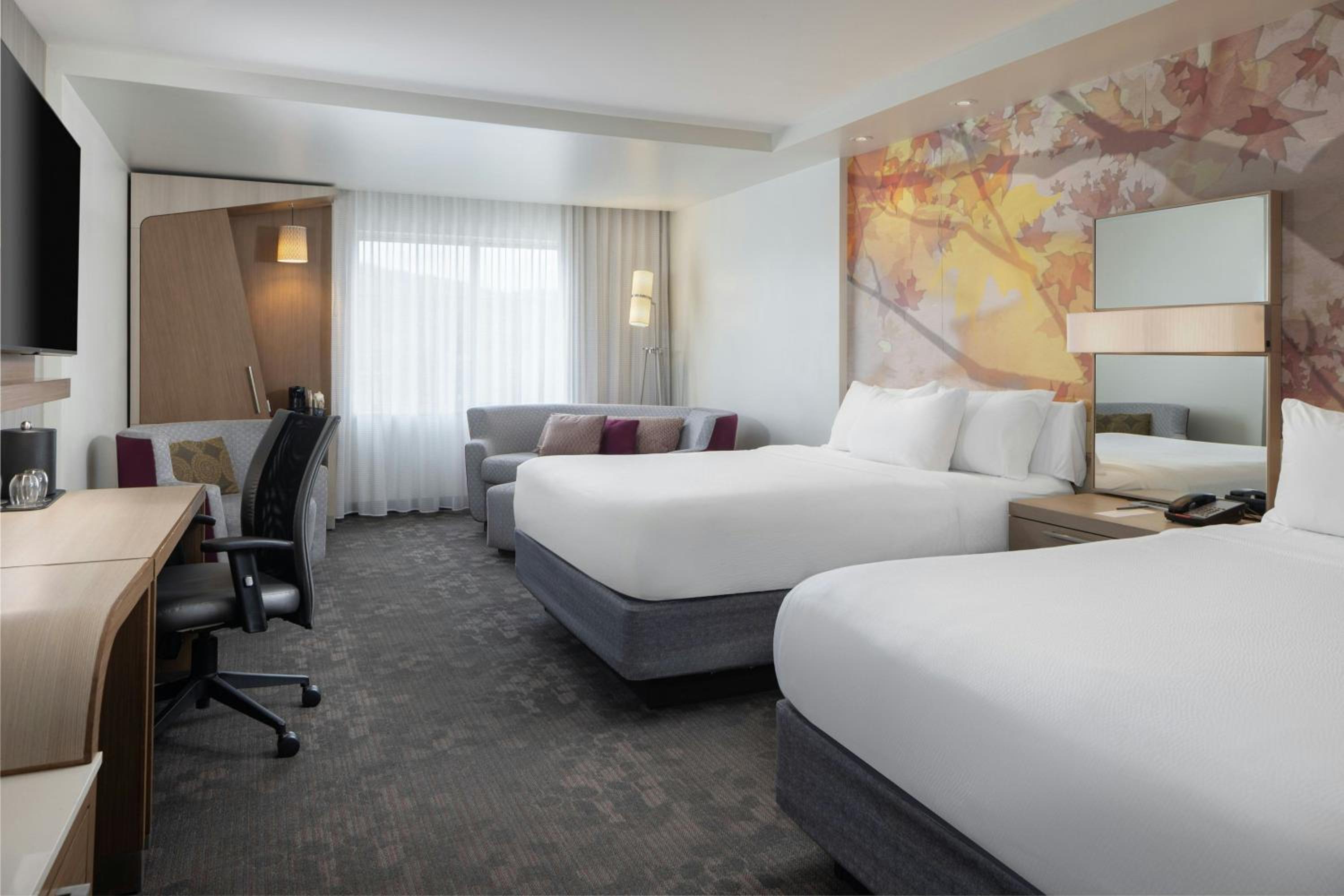 Larger Queen Room with Two Queen Beds and Sofa Bed