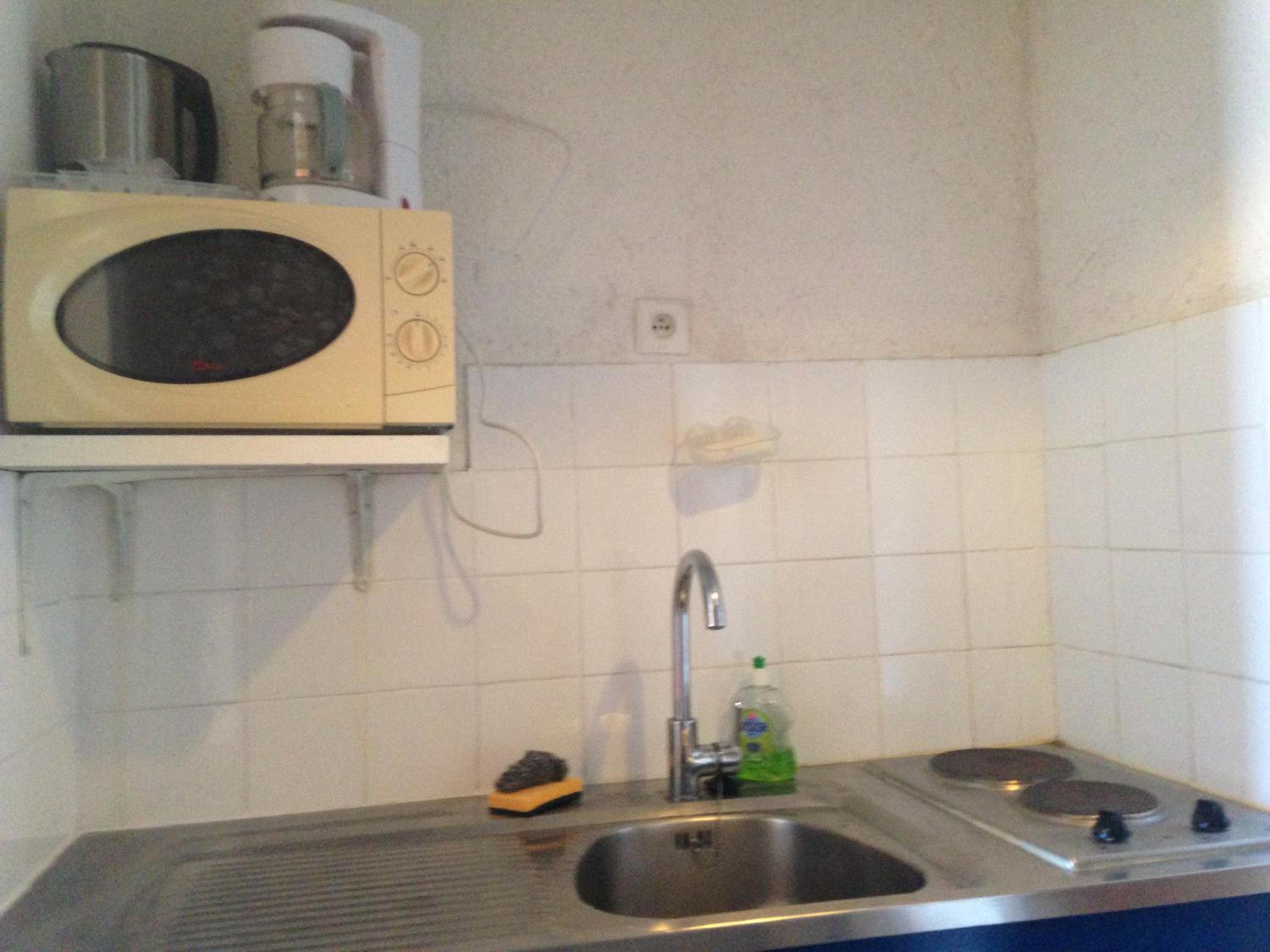 Apartment with Balcony - Photo 10