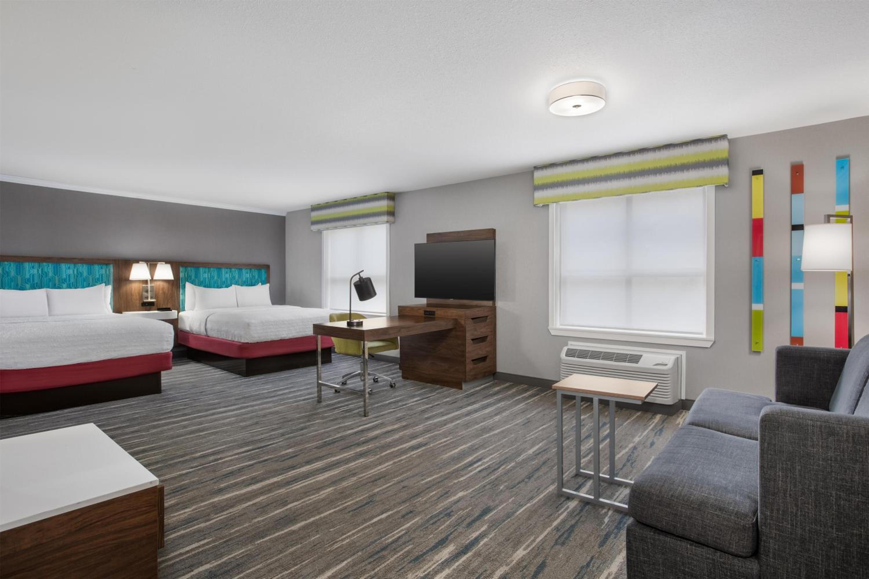 Queen Suite with Two Queen Beds and Sofa Bed - Non-Smoking photo 1